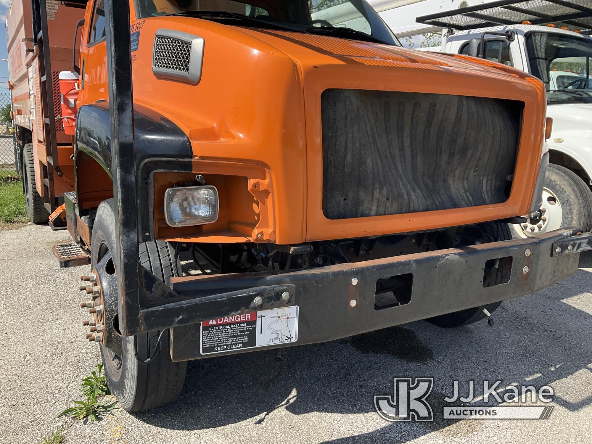 (Kansas City, MO) Altec LRV55, Over-Center Bucket Truck mounted behind cab on 2005 GMC C7500 Chipper