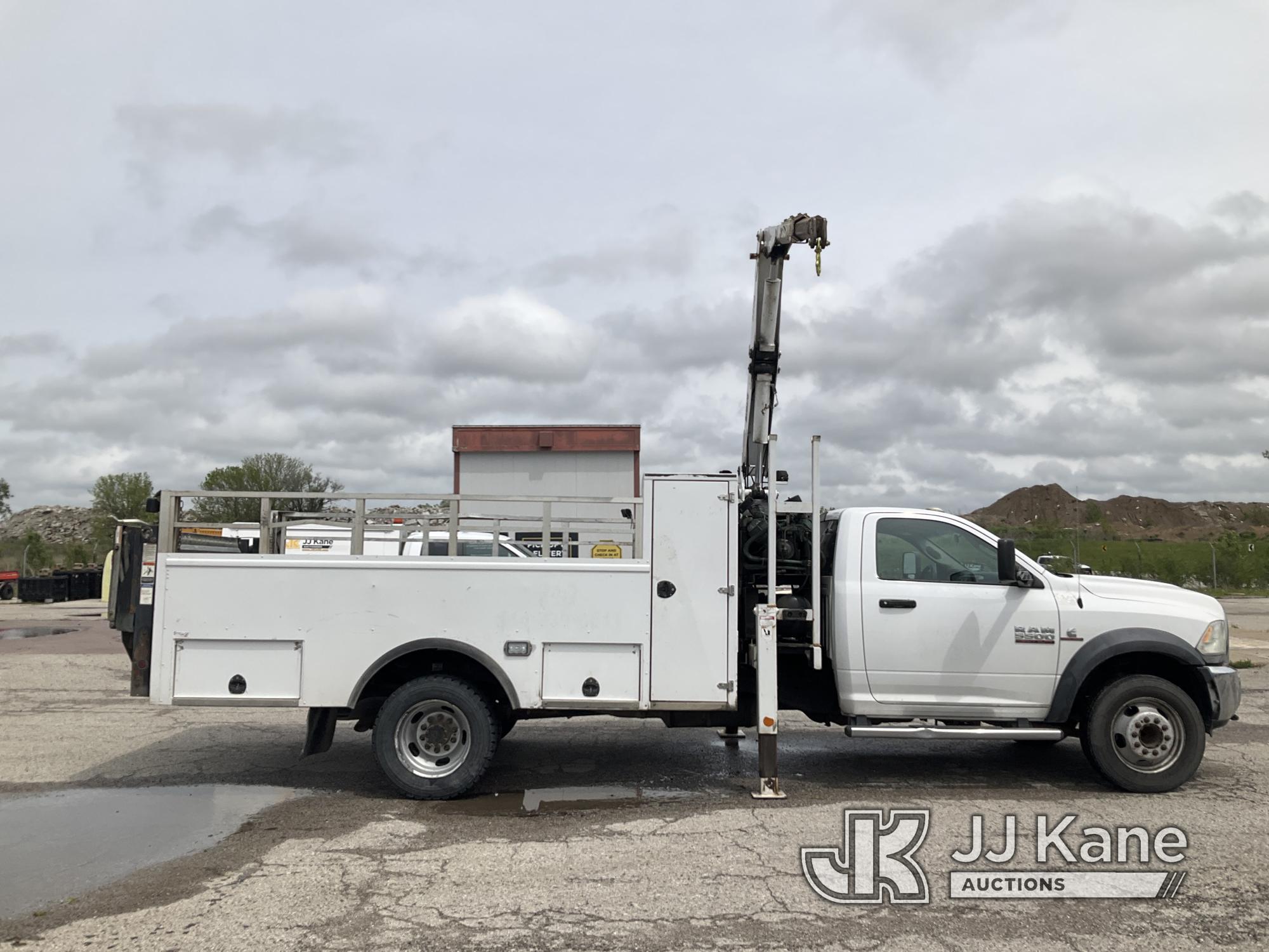 (Kansas City, MO) Stellar 3200A, Knuckleboom Crane mounted behind cab on 2014 RAM 5500 Flatbed/Servi