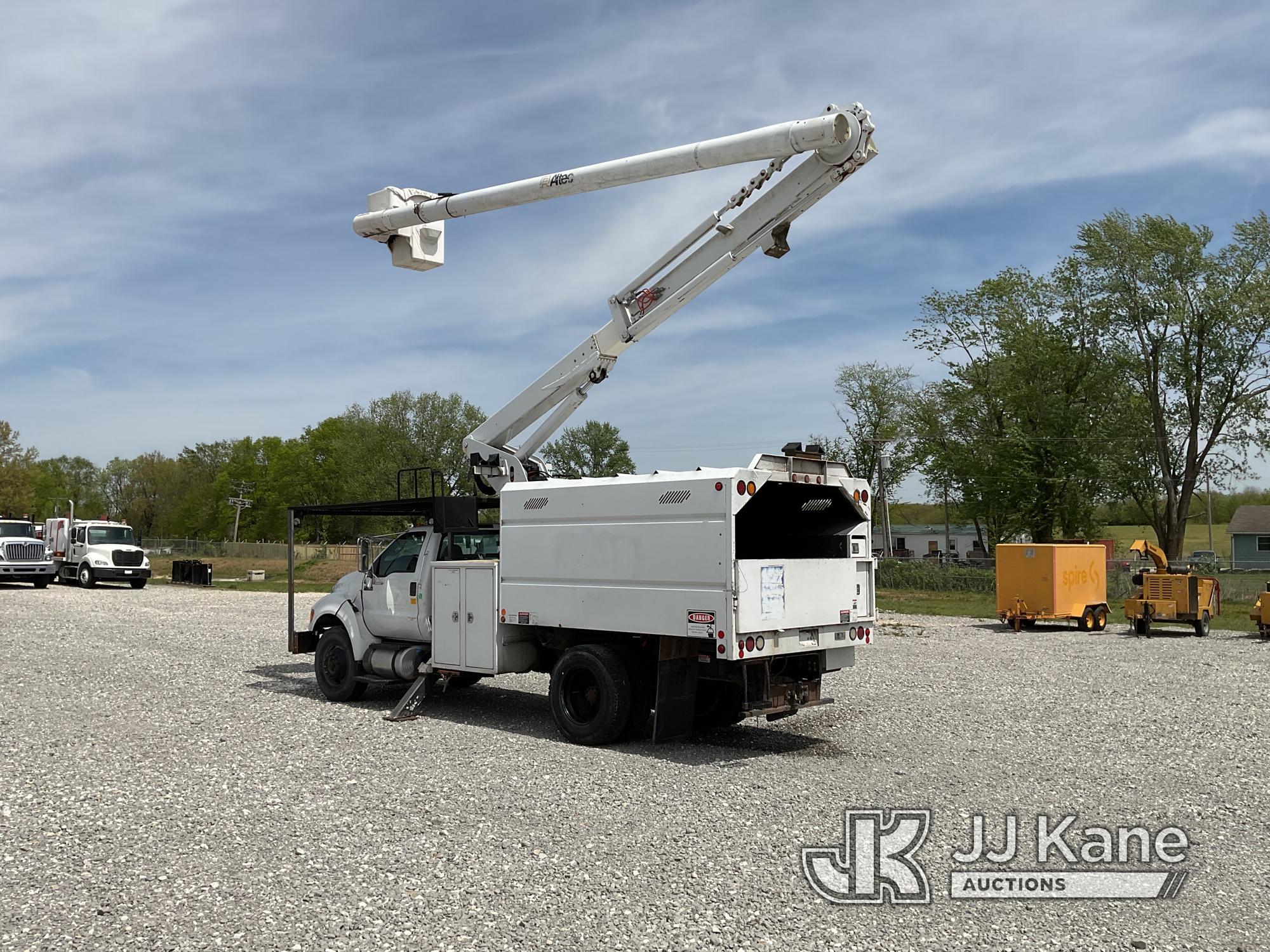 (Hawk Point, MO) Altec LR756, Over-Center Bucket Truck mounted behind cab on 2013 Ford F750 Chipper