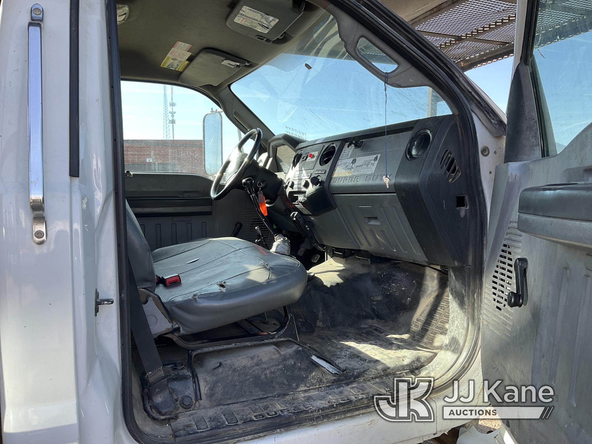 (Des Moines, IA) Altec LR756, Over-Center Bucket Truck mounted behind cab on 2012 Ford F750 Chipper