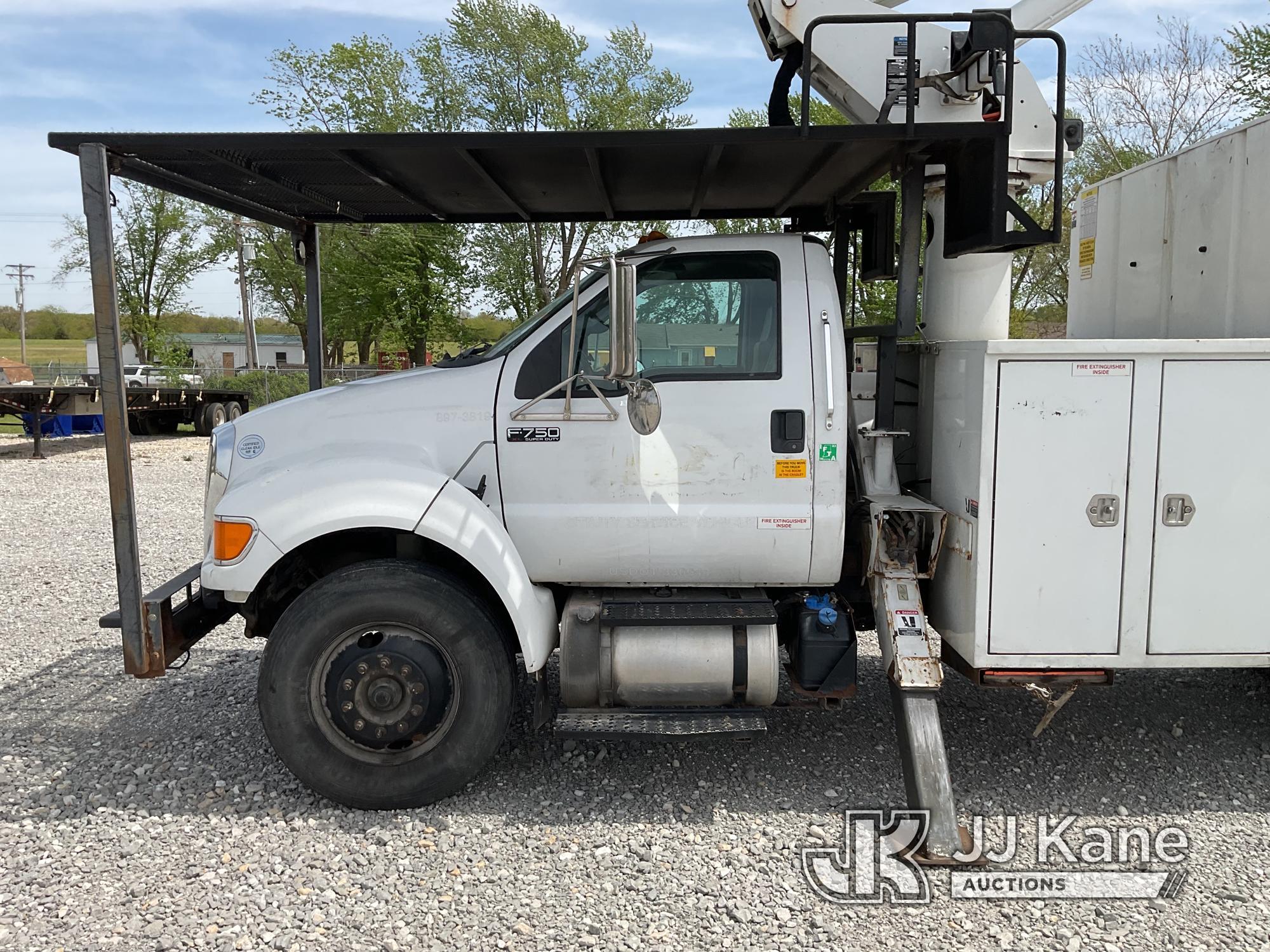 (Hawk Point, MO) Altec LR756, Over-Center Bucket Truck mounted behind cab on 2013 Ford F750 Chipper