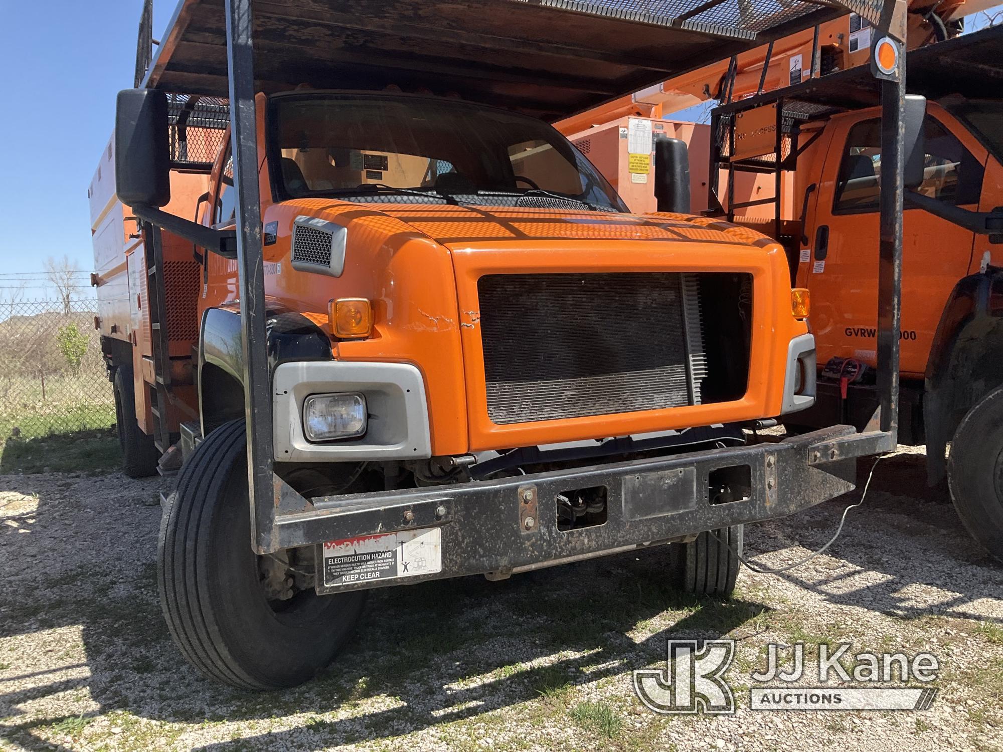 (Kansas City, MO) Altec LRV55, Over-Center Bucket Truck mounted behind cab on 2006 GMC C7500 Chipper