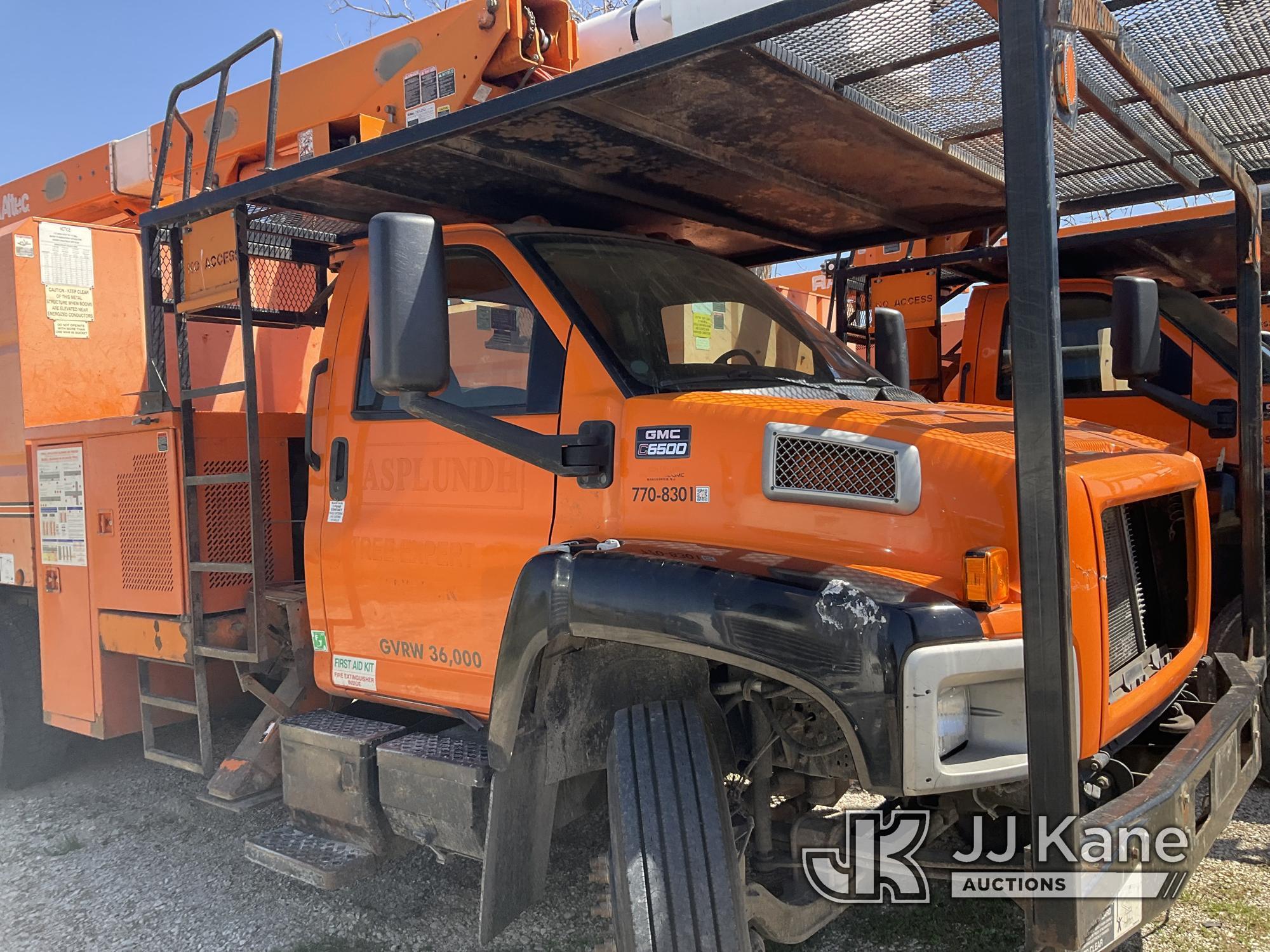 (Kansas City, MO) Altec LRV55, Over-Center Bucket Truck mounted behind cab on 2006 GMC C7500 Chipper