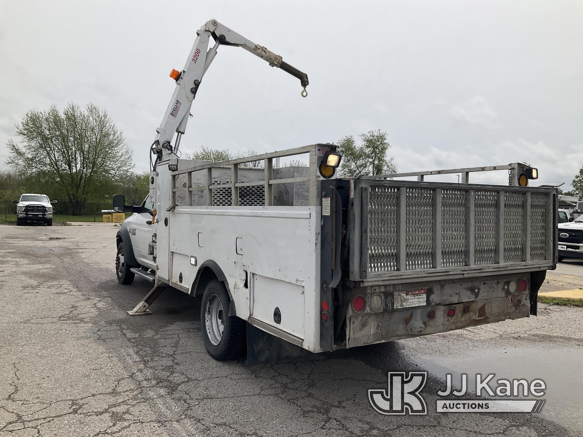 (Kansas City, MO) Stellar 3200A, Knuckleboom Crane mounted behind cab on 2014 RAM 5500 Flatbed/Servi