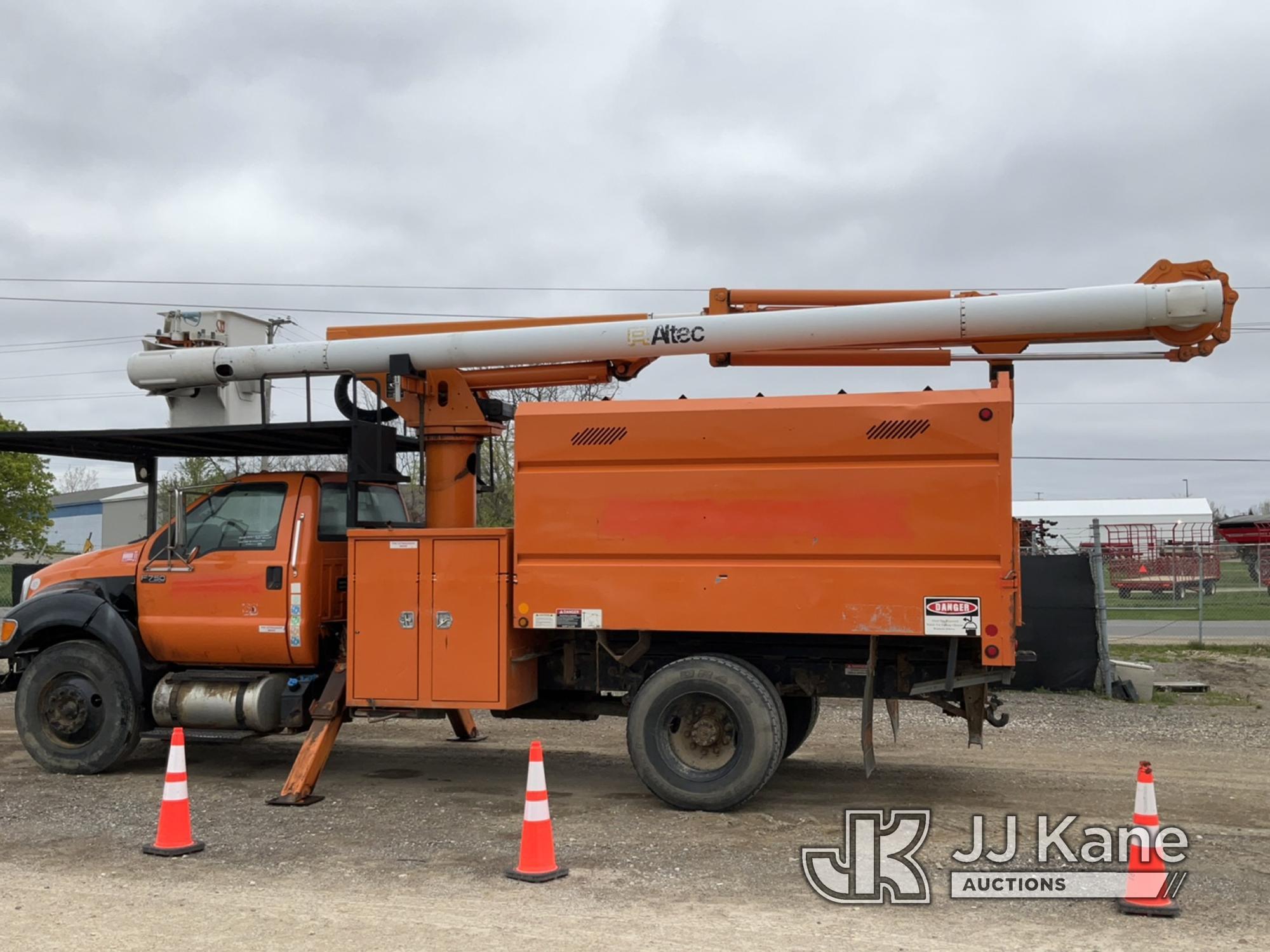 (Charlotte, MI) Altec LR756, Over-Center Bucket Truck mounted behind cab on 2013 Ford F750 Chipper D