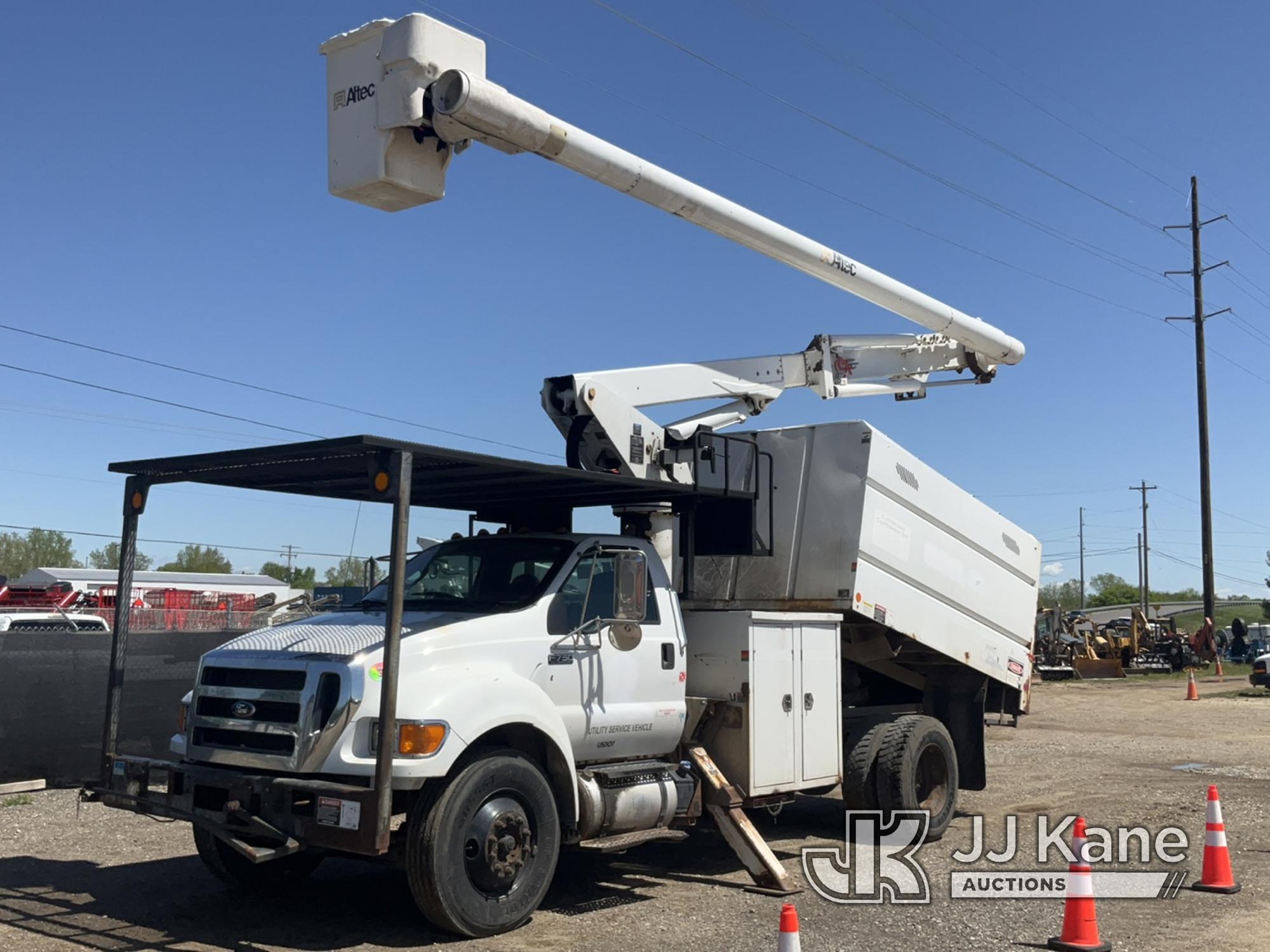 (Charlotte, MI) Altec LR756, Over-Center Bucket Truck mounted behind cab on 2013 Ford F750 Chipper D