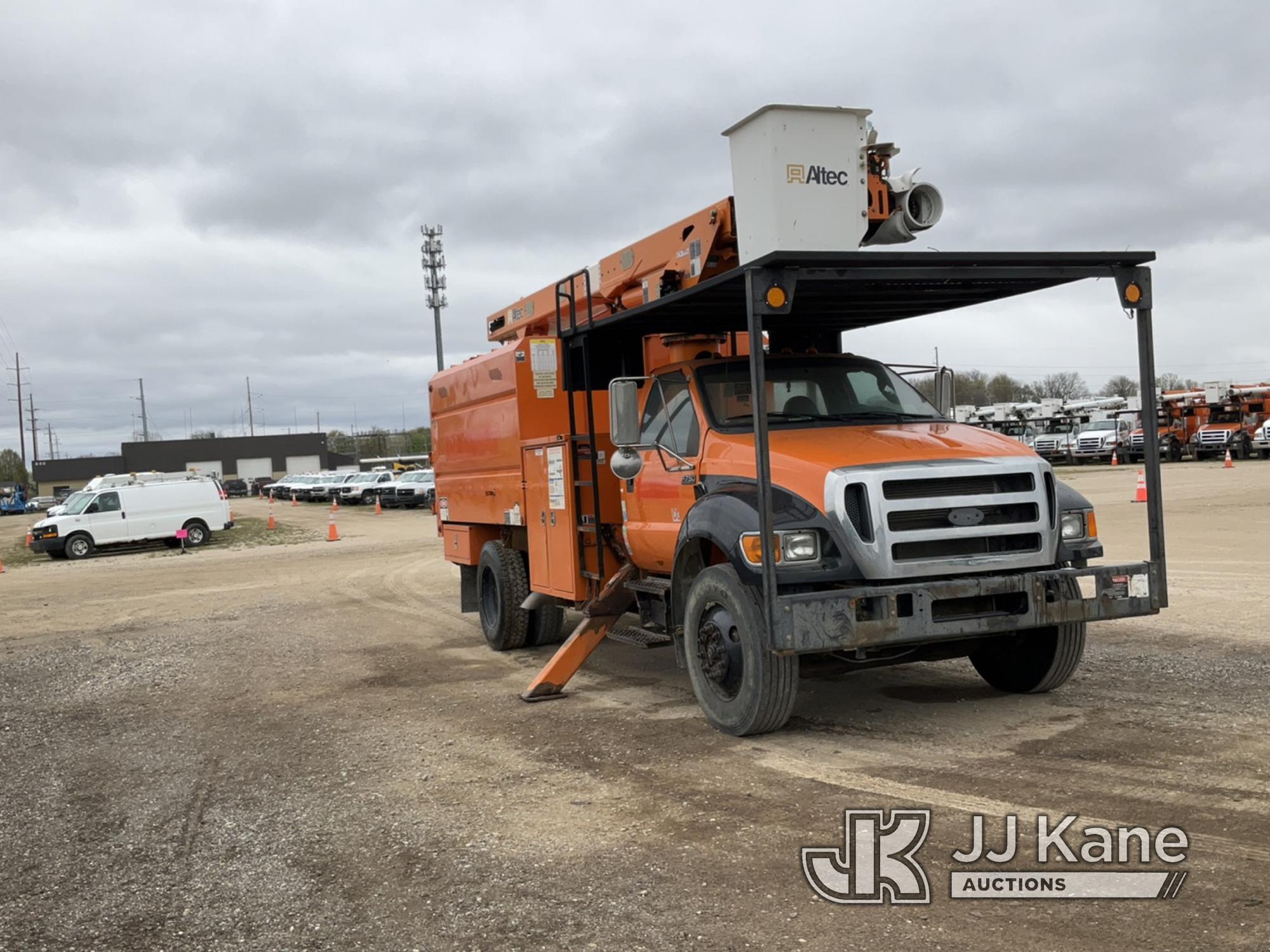 (Charlotte, MI) Altec LR756, Over-Center Bucket Truck mounted behind cab on 2013 Ford F750 Chipper D