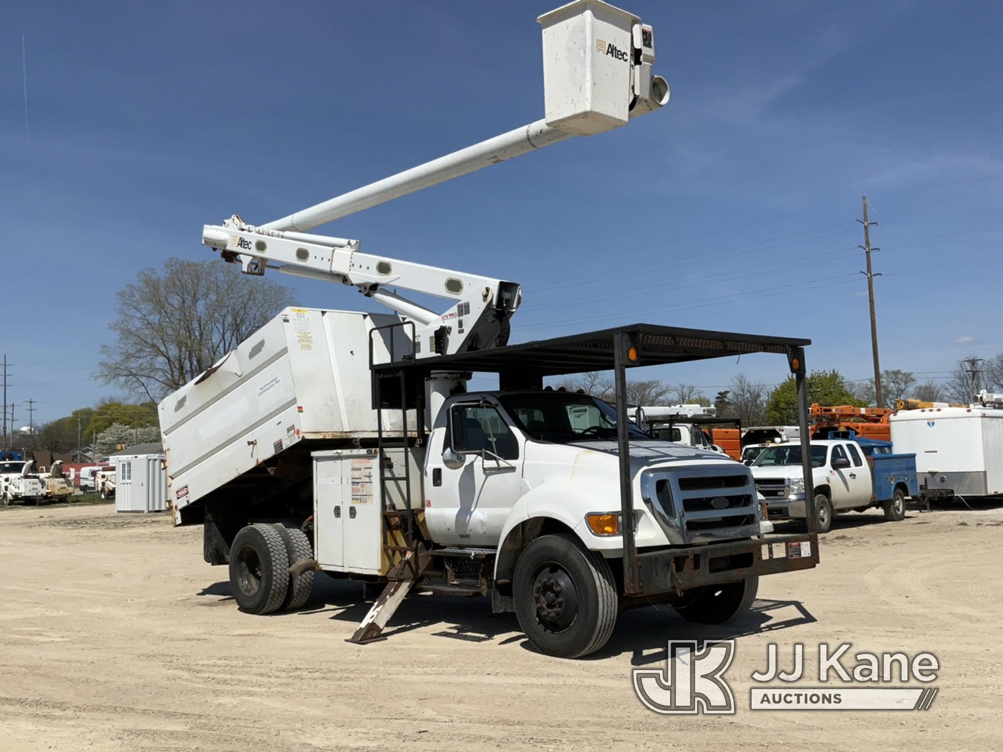 (Charlotte, MI) Altec LR756, Over-Center Bucket Truck mounted behind cab on 2013 Ford F750 Chipper D