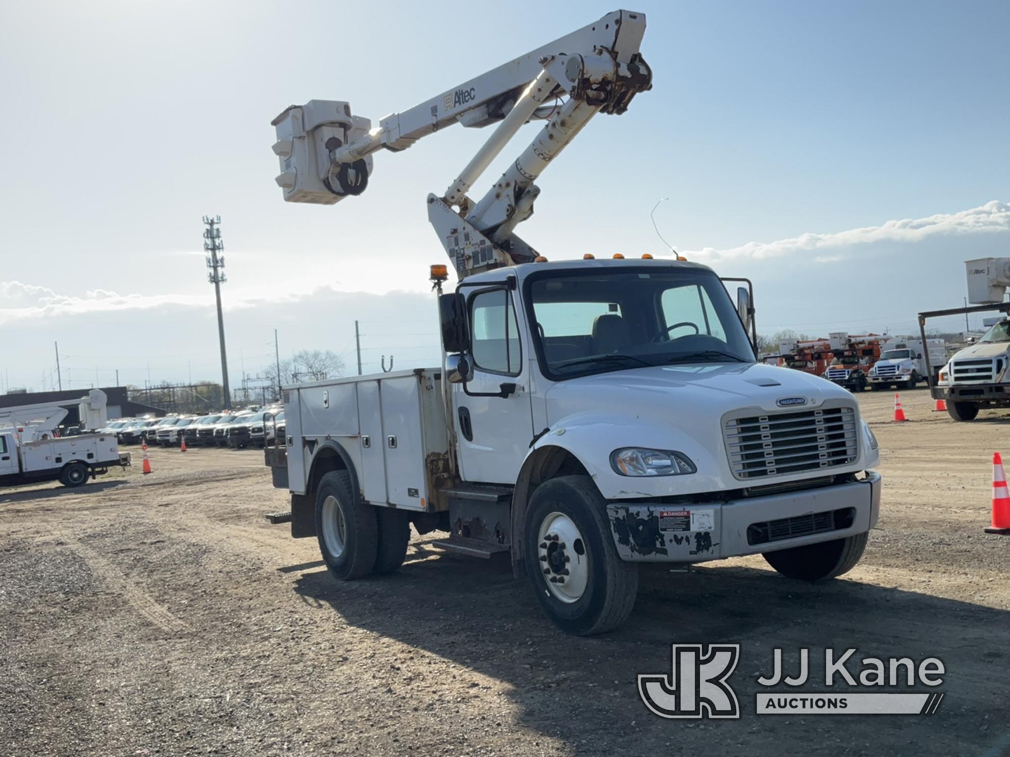 (Charlotte, MI) Altec TA40, Articulating & Telescopic Bucket Truck mounted behind cab on 2015 FREIGH