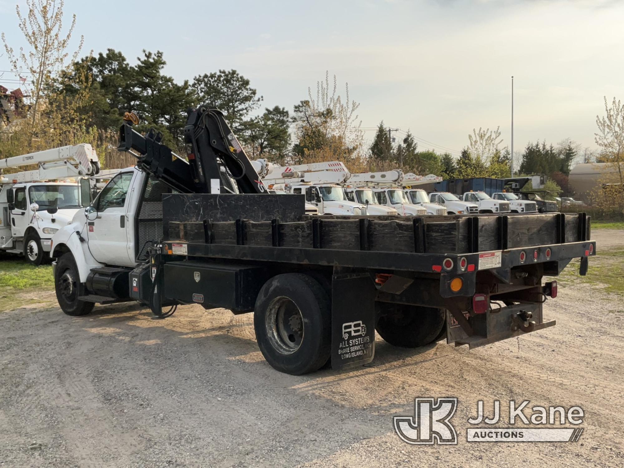 (Bellport, NY) HIAB 111-B-3CLX, Knuckleboom Crane mounted behind cab on 2011 Ford F750 Flatbed Truck