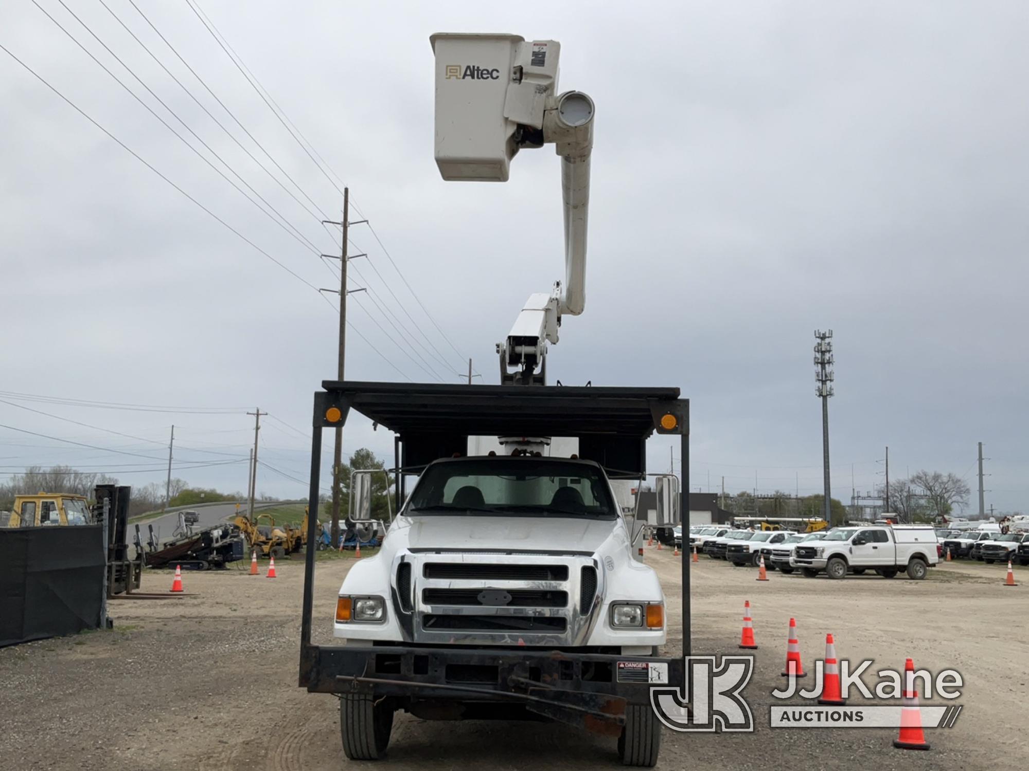 (Charlotte, MI) Altec LR756, Over-Center Bucket Truck mounted behind cab on 2013 Ford F750 Chipper D