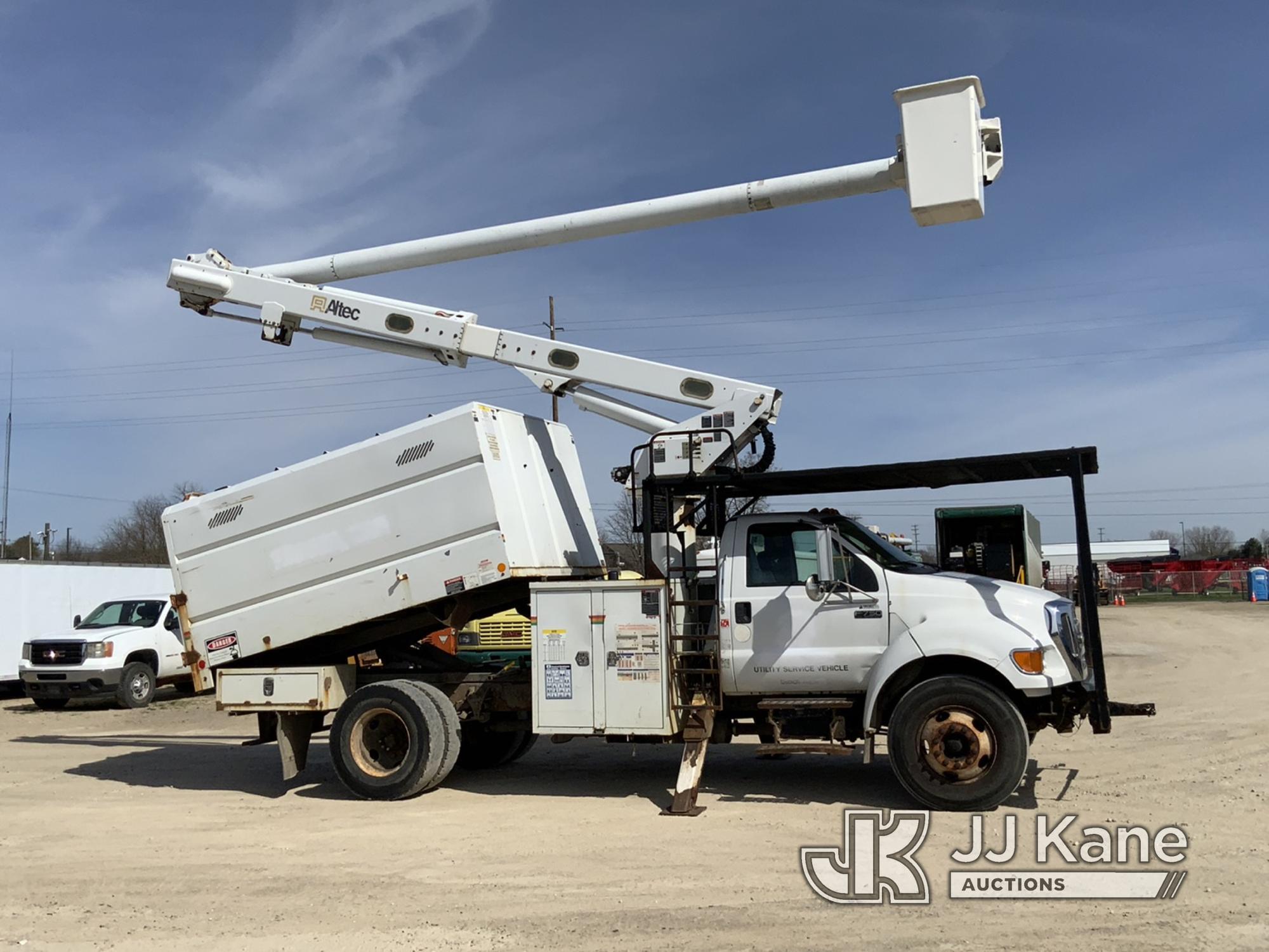 (Charlotte, MI) Altec LRV55, Over-Center Bucket Truck mounted behind cab on 2010 Ford F750 Chipper D