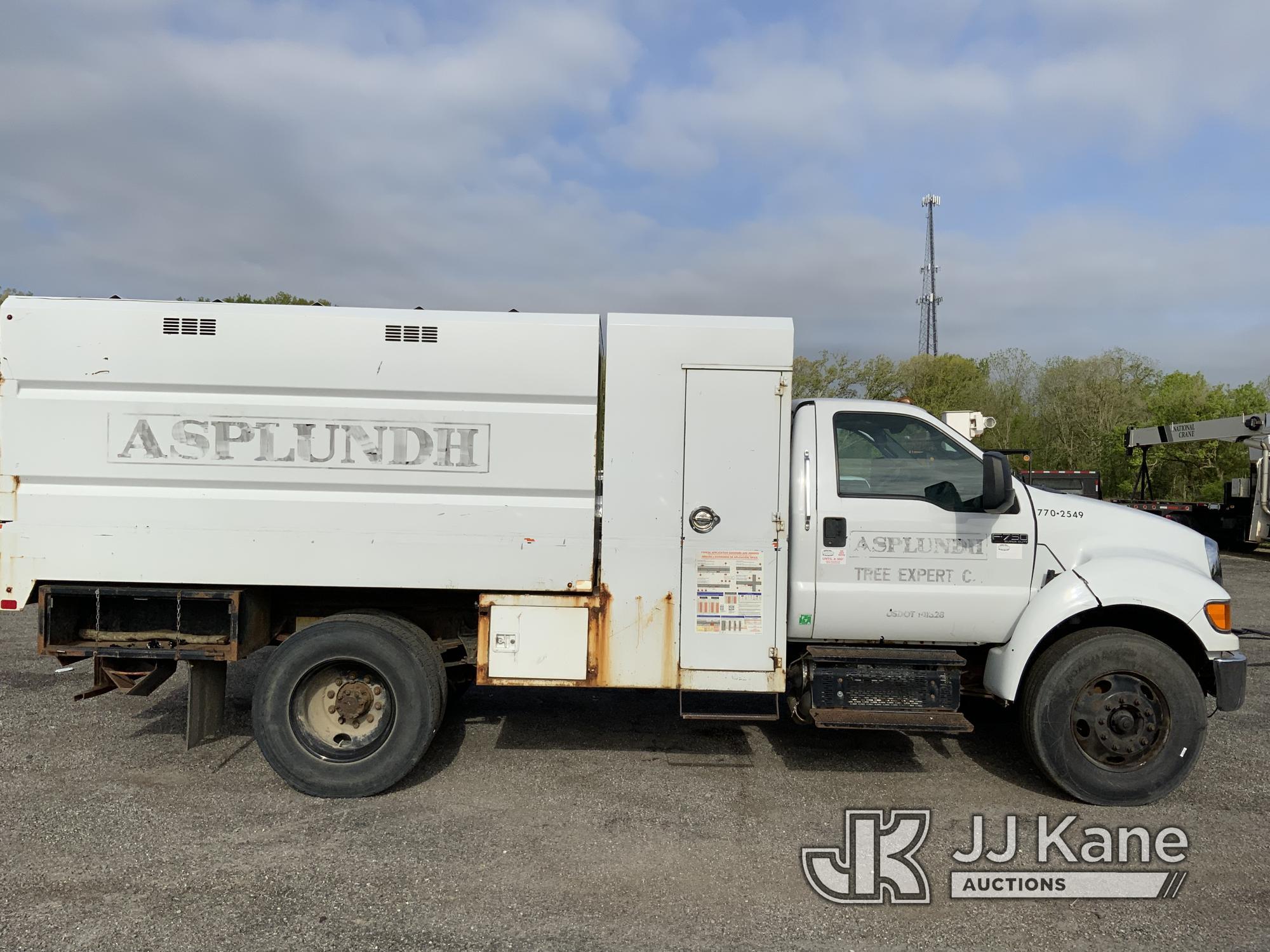 (Ashland, OH) 2012 Ford F750 Chipper Dump Truck Runs & Moves) (Seller States: Needs Brakes Replaced