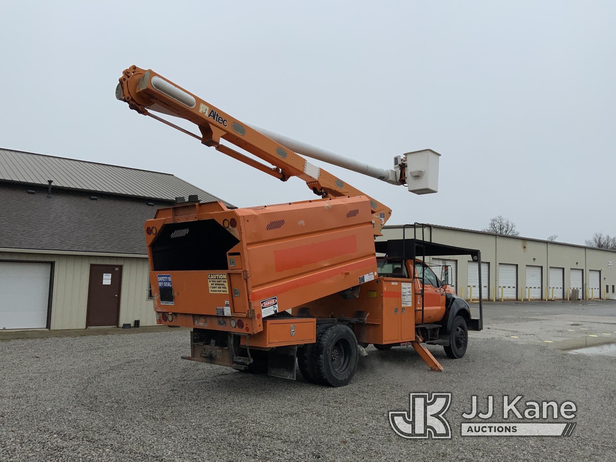 (Fort Wayne, IN) Altec LR756, Over-Center Bucket Truck mounted behind cab on 2013 Ford F750 Chipper