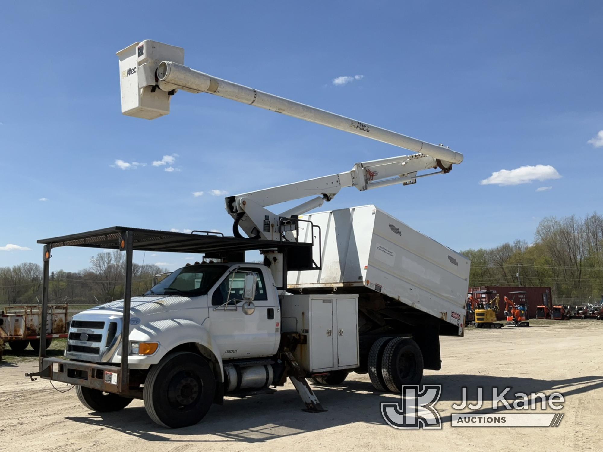 (Charlotte, MI) Altec LR756, Over-Center Bucket Truck mounted behind cab on 2013 Ford F750 Chipper D