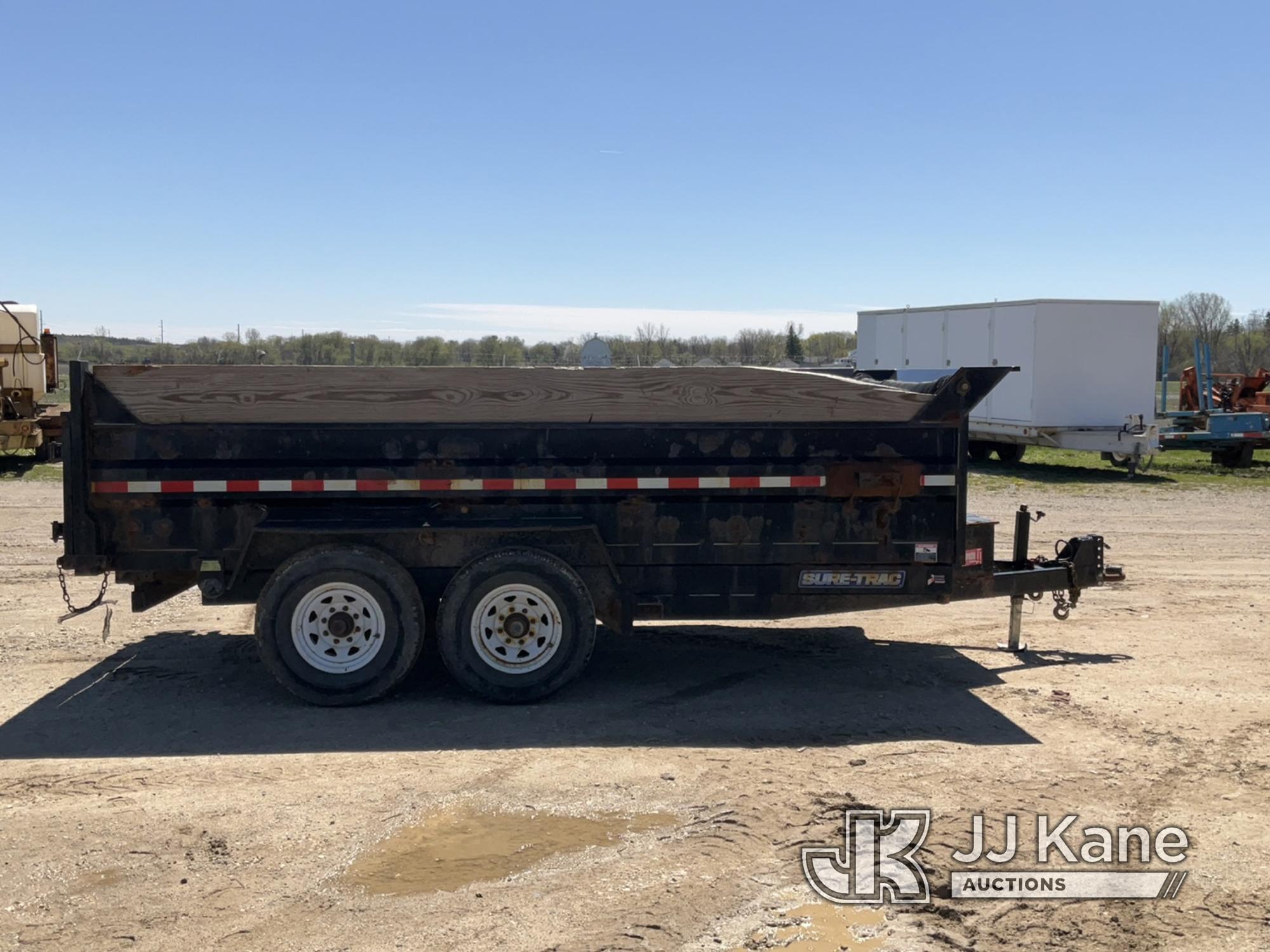 (Charlotte, MI) 2016 Sure-Trac T/A Dump Trailer Rust, Dump Operates. Seller States: crane is rusted