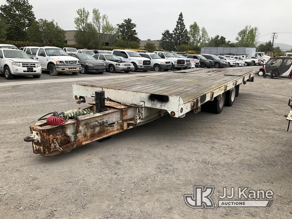 (Jurupa Valley, CA) 2003 Monroe Towmaster T/A Tagalong Flatbed Trailer Trailer Length: 24ft 8in, Tra