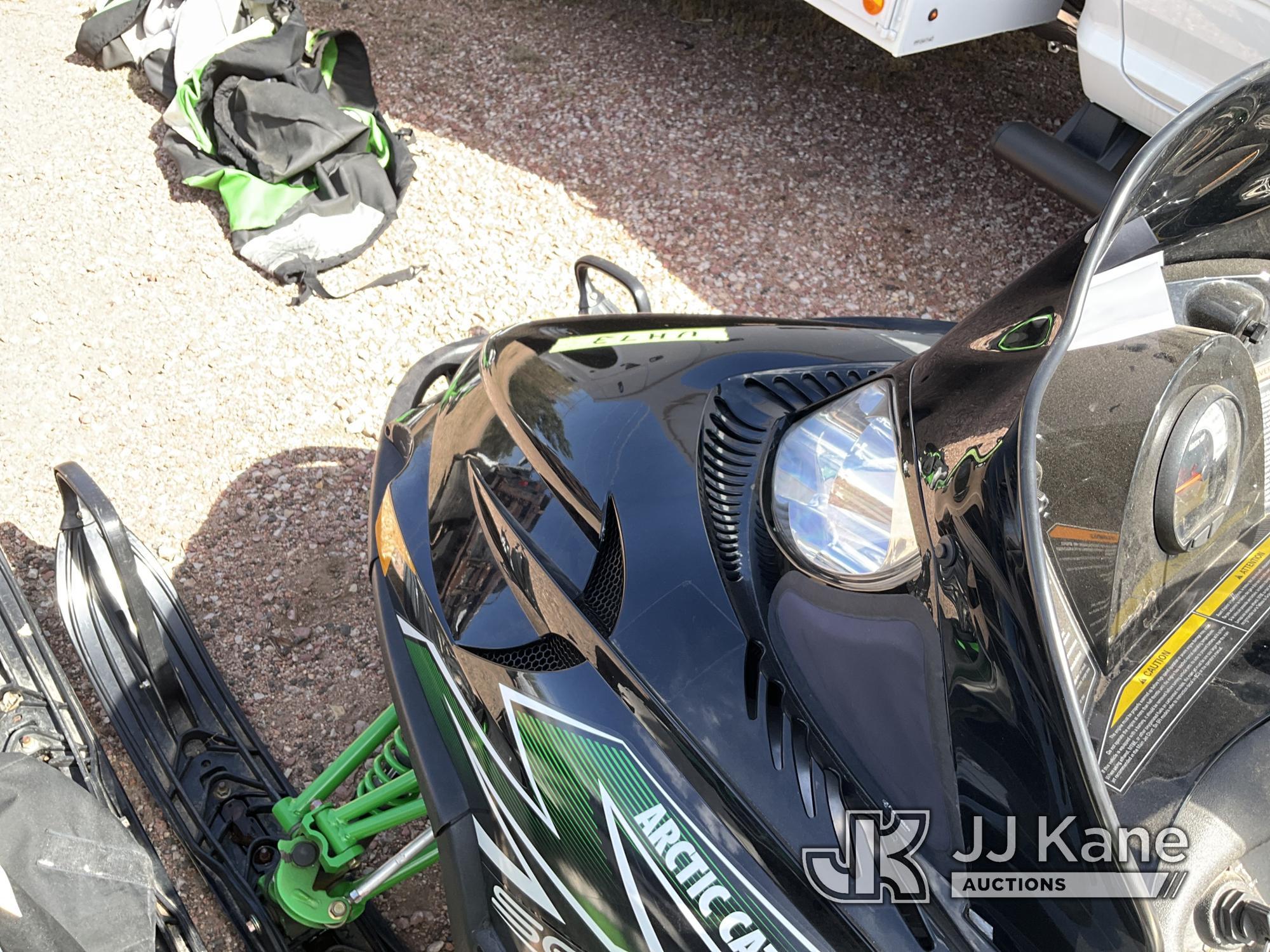 (Castle Rock, CO) 2011 Arctic Cat Snowmobile Not Running, Condition Unknown, Fuel Leak) (Seller Stat