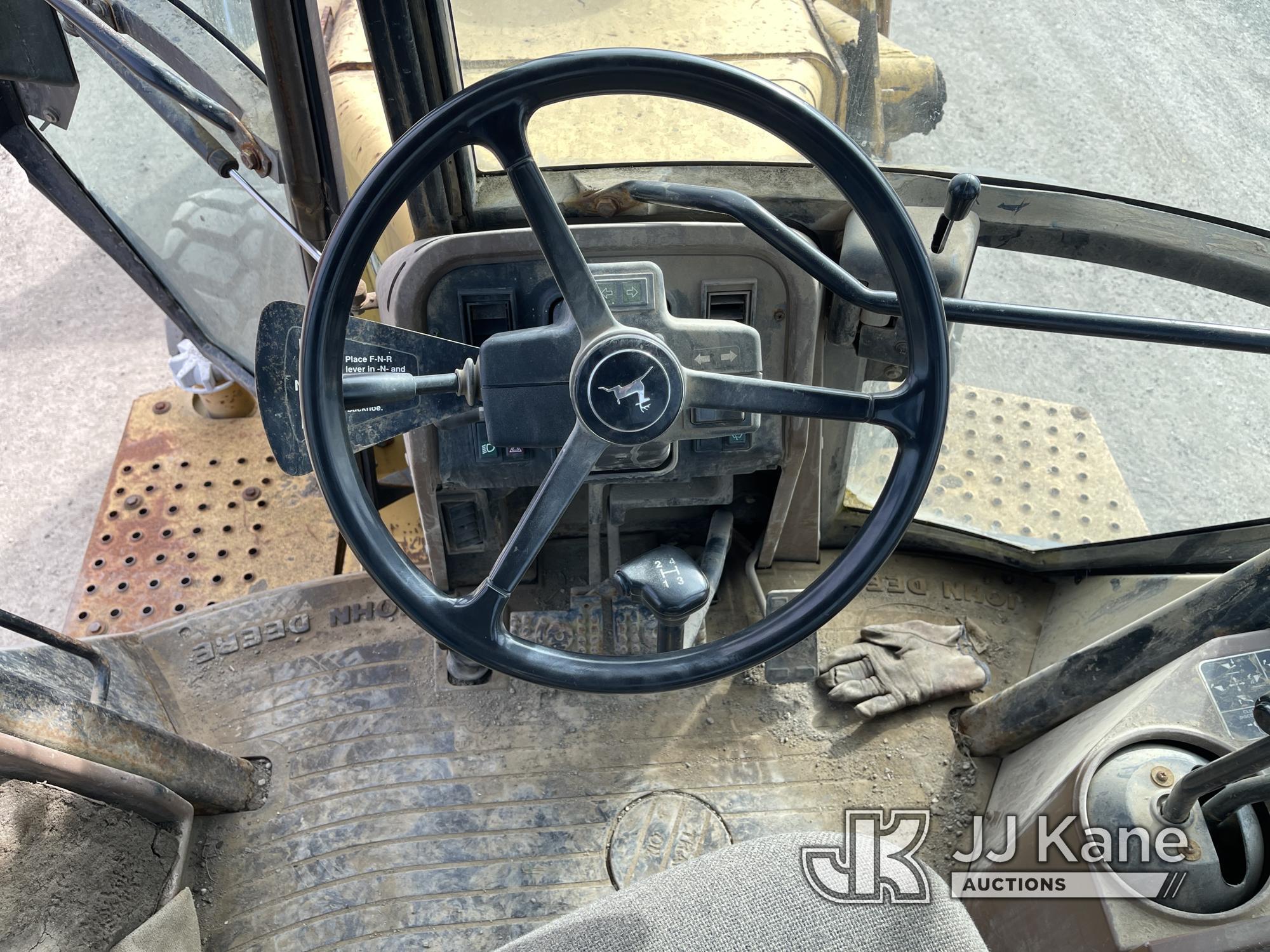 (Eureka, CA) 1995 John Deere 310D 4x4 Backhoe Loader Runs & Operates