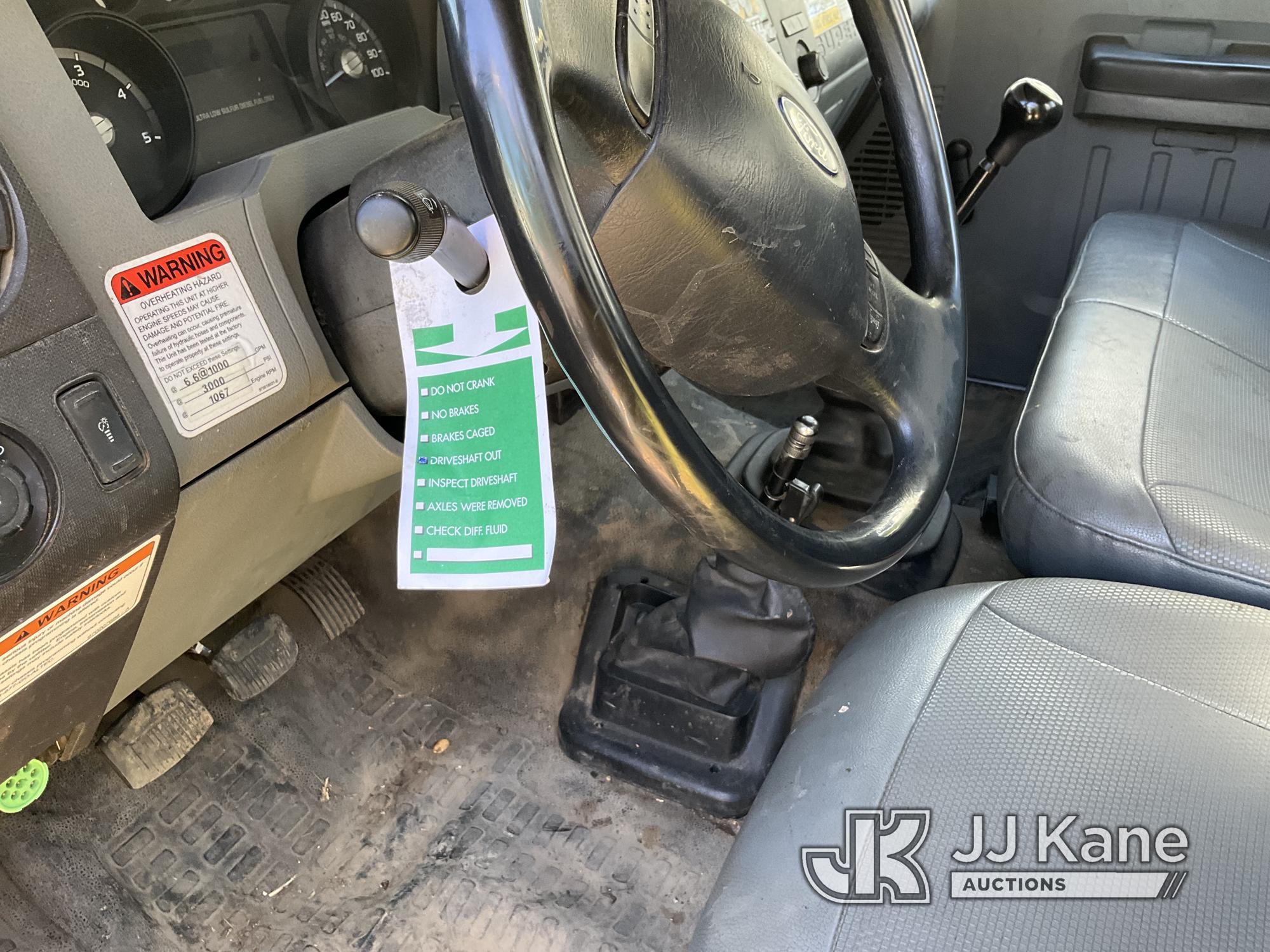 (Anderson, CA) Altec LR756, Over-Center Bucket mounted behind cab on 2013 Ford F750 Chipper Dump Tru