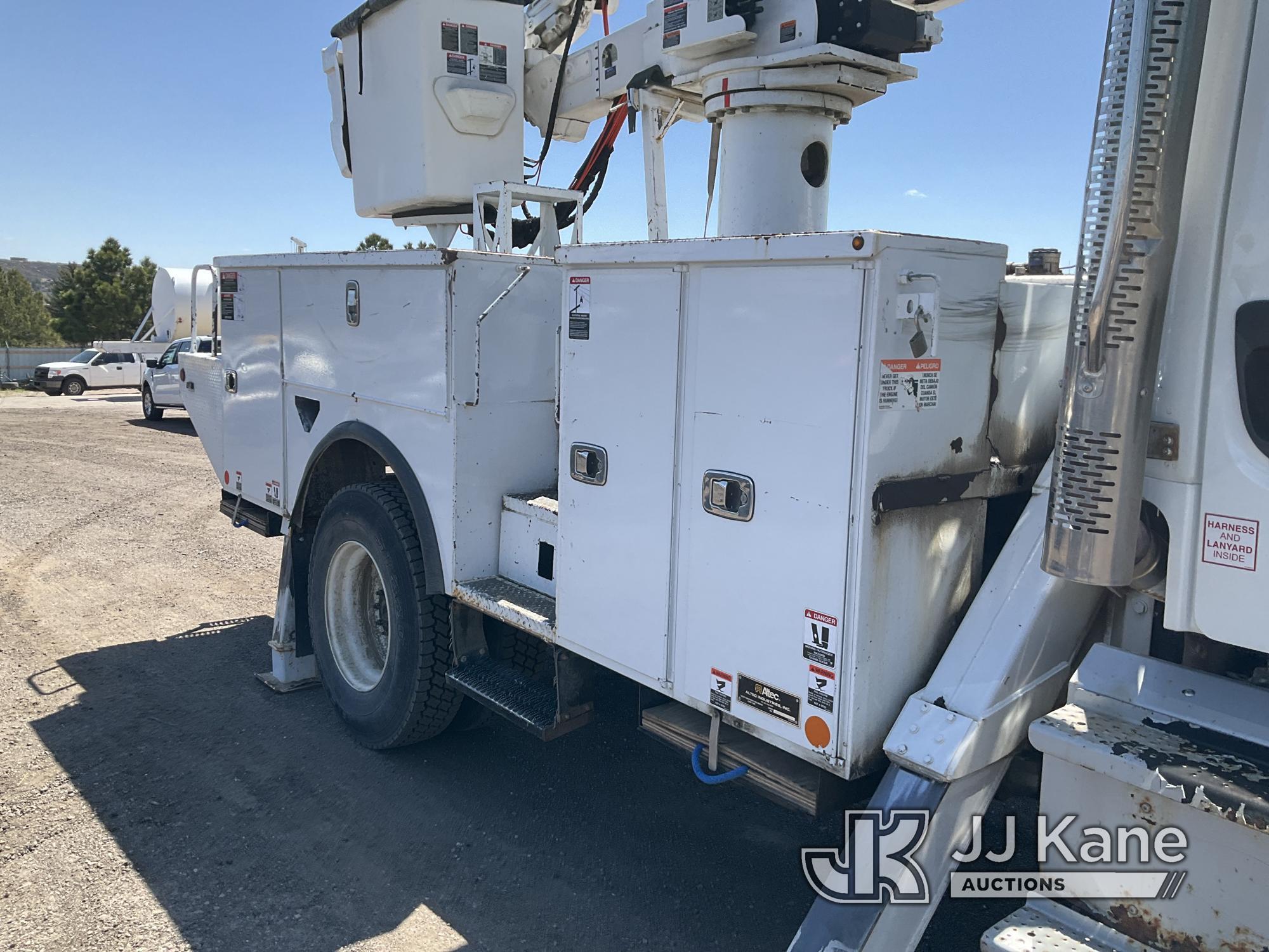 (Castle Rock, CO) Altec TA55, Articulating & Telescopic Material Handling Bucket Truck mounted behin