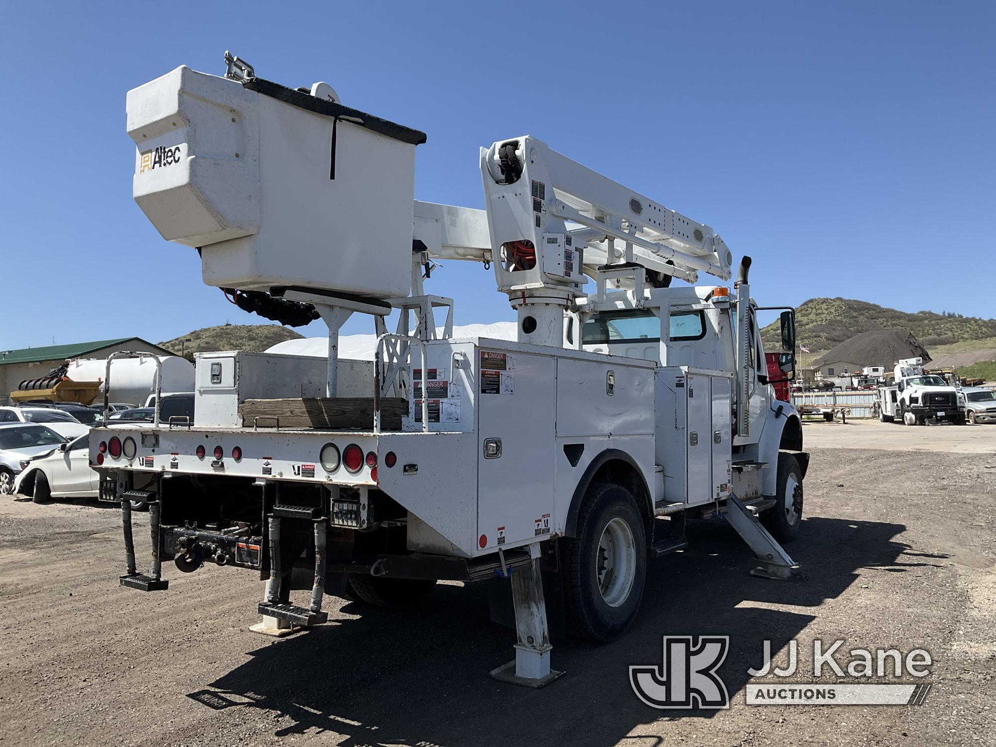 (Castle Rock, CO) Altec TA55, Articulating & Telescopic Material Handling Bucket Truck mounted behin