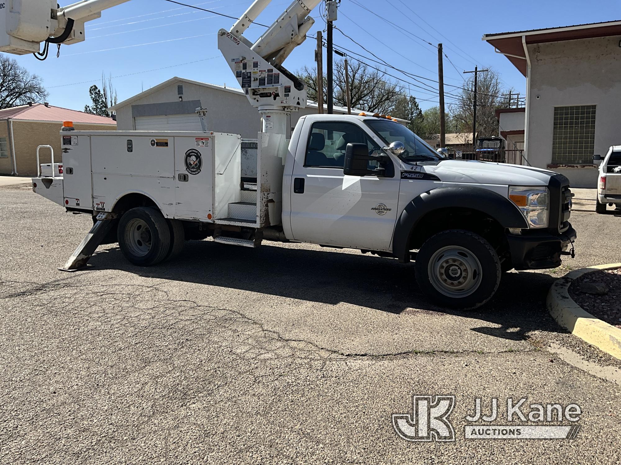 (Springer, NM) Altec TA37M, Articulating & Telescopic Material Handling Bucket Truck mounted behind