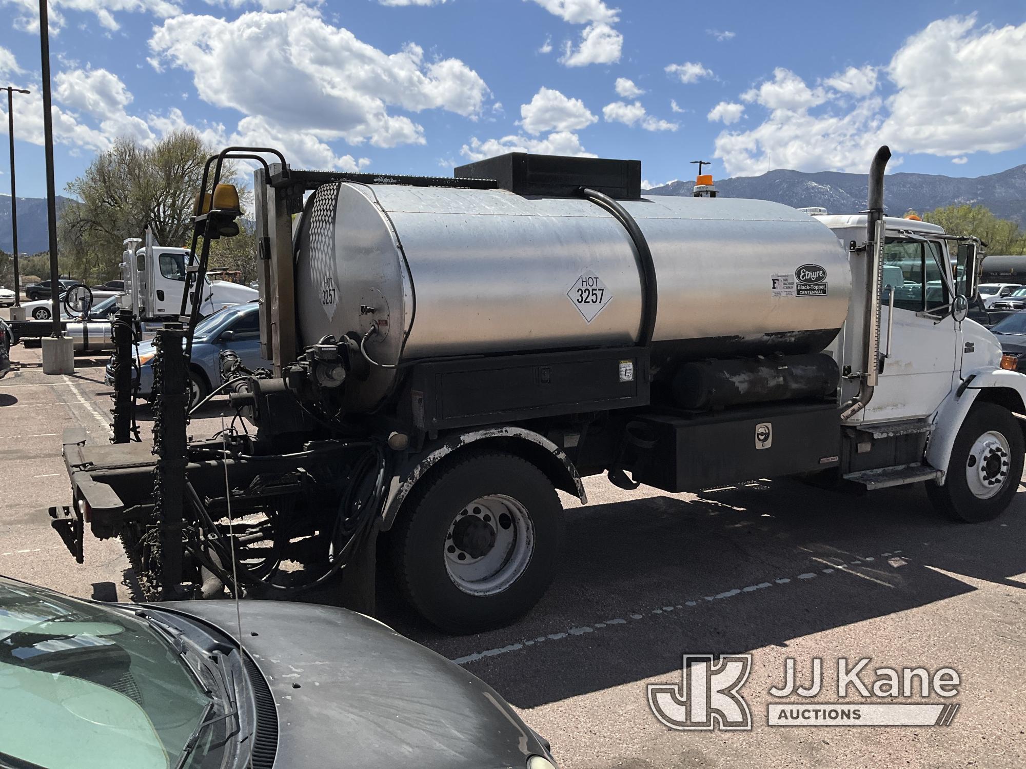(Castle Rock, CO) 1999 Freightliner FL70 Flatbed/Tank Truck Runs, Moves & Operates.) (Seller States: