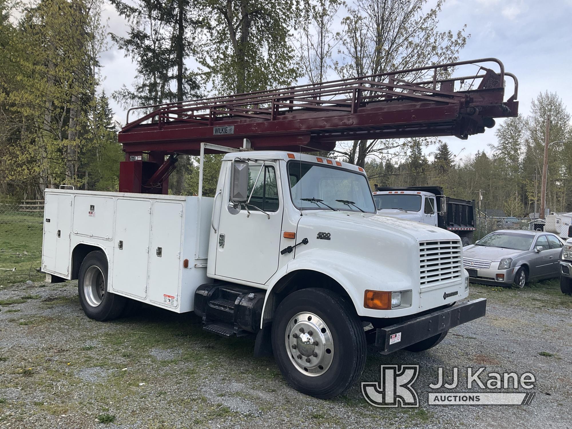 (Eatonville, WA) Wilkie 60, Ladder Truck rear mounted on 2001 International 4700 Utility Truck Not R