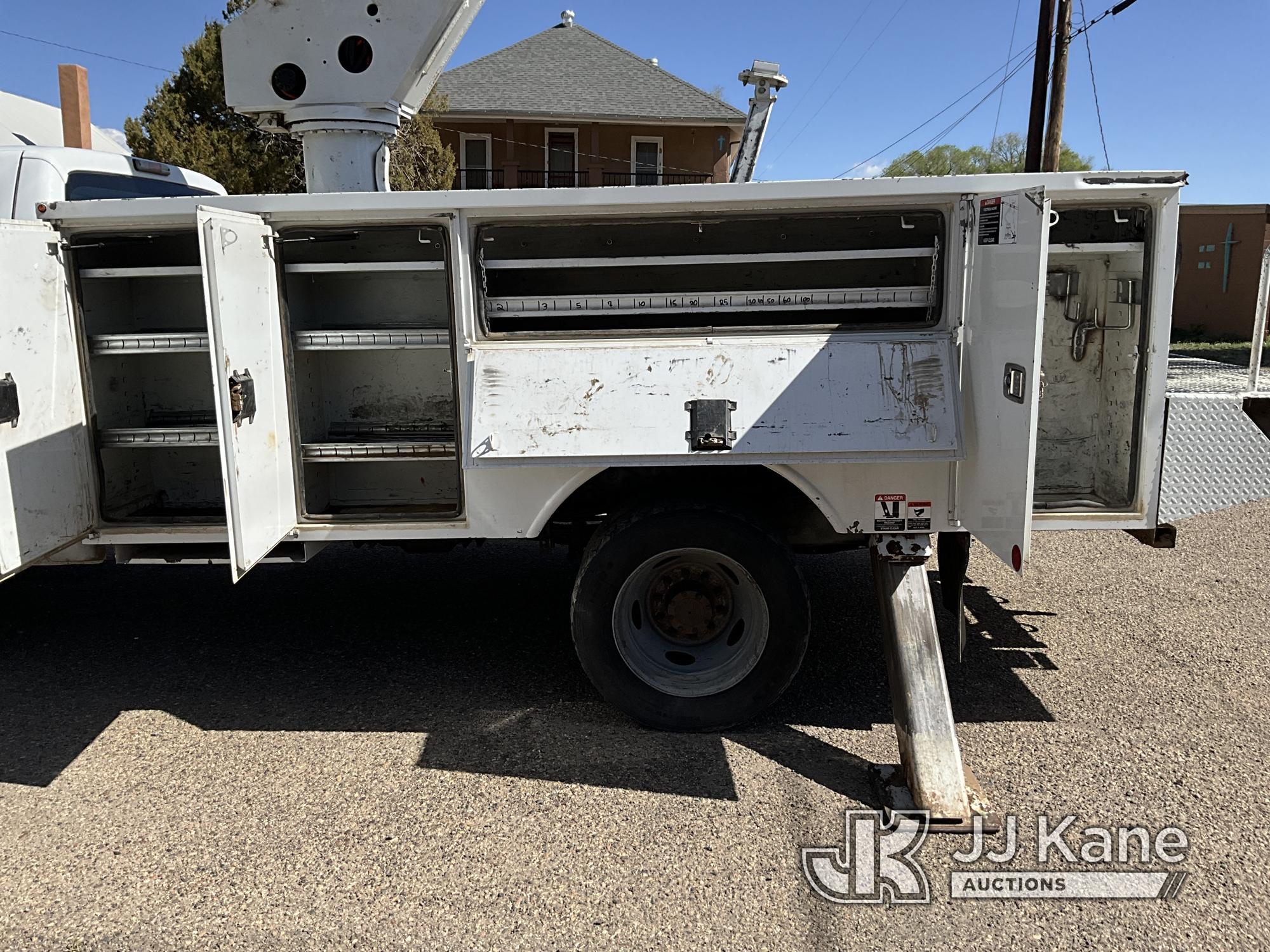 (Springer, NM) Altec TA37M, Articulating & Telescopic Material Handling Bucket Truck mounted behind