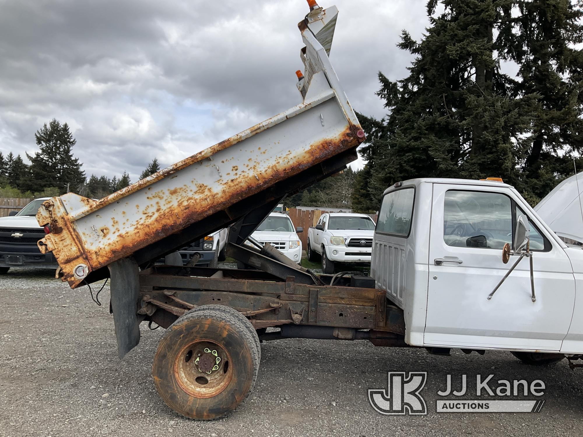 (Tacoma, WA) 1997 Ford F350 4x4 Dump Truck Runs, Moves & Dump Operates) (Rust Damage