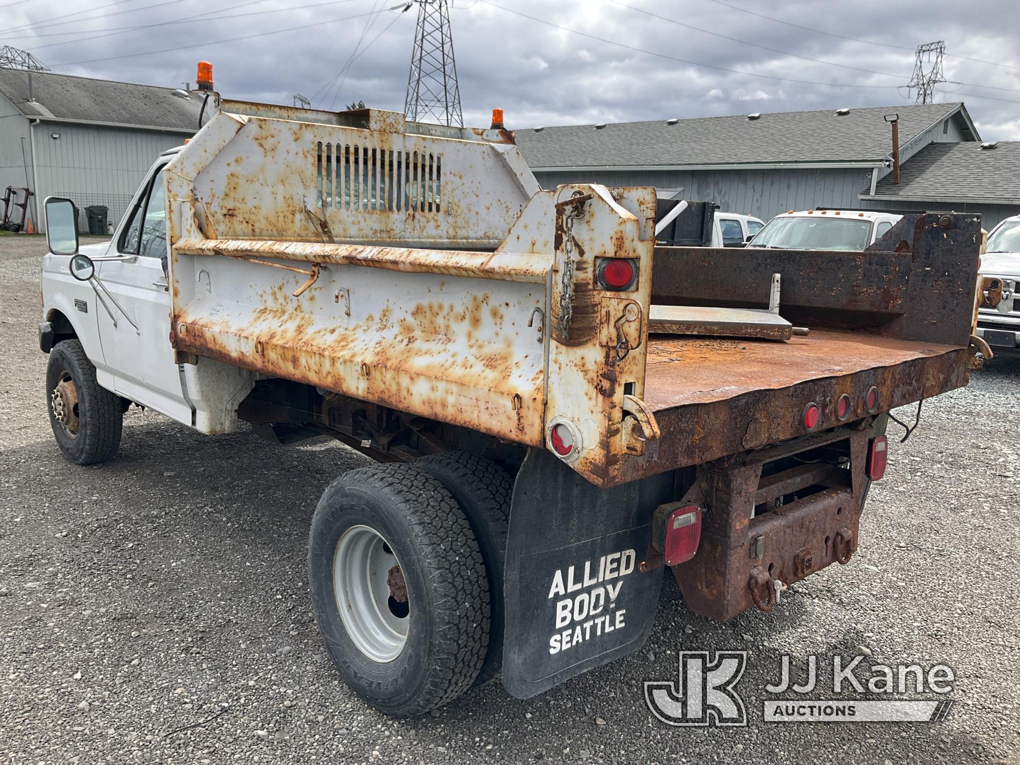 (Tacoma, WA) 1997 Ford F350 4x4 Dump Truck Runs, Moves & Dump Operates) (Rust Damage