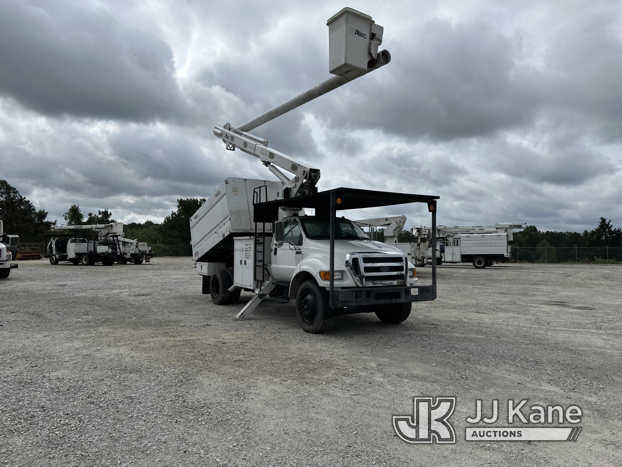 (Villa Rica, GA) Altec LR756, Over-Center Bucket Truck mounted behind cab on 2013 Ford F750 Chipper