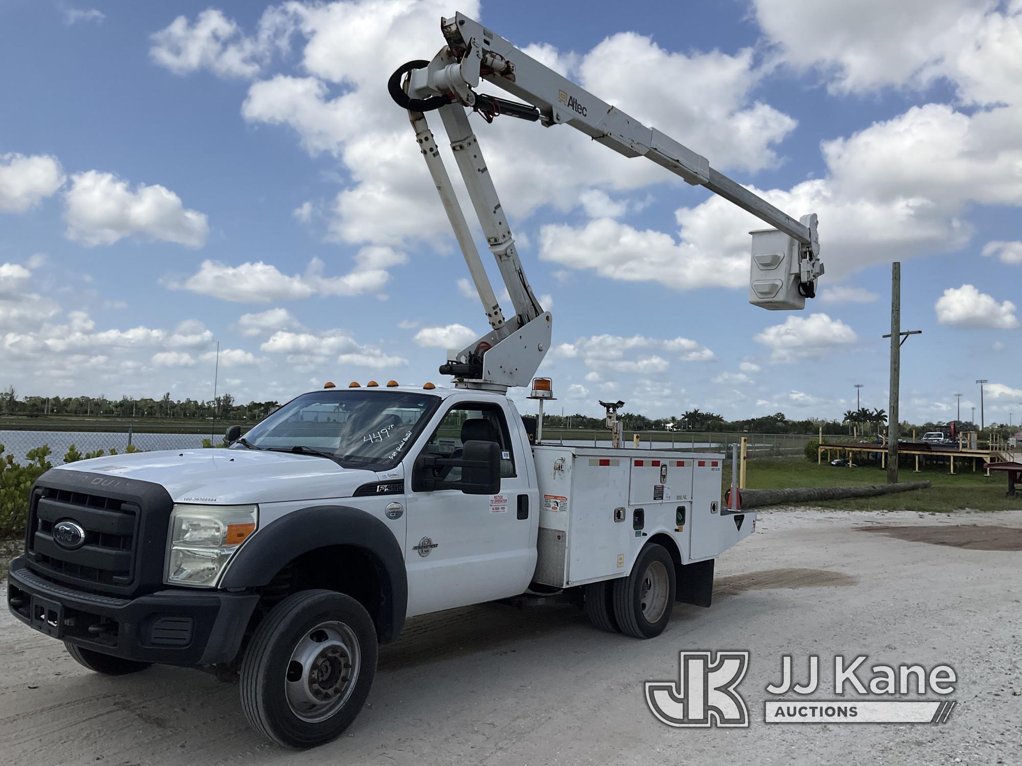 (Westlake, FL) Altec AT37G, Bucket Truck mounted behind cab on 2015 Ford F550 4x4 Flatbed/Utility Tr