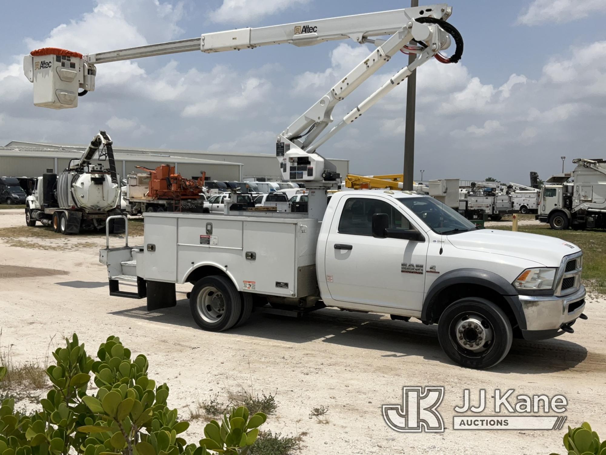 (Westlake, FL) Altec AT40G, Articulating & Telescopic Bucket Truck mounted behind cab on 2015 RAM 55