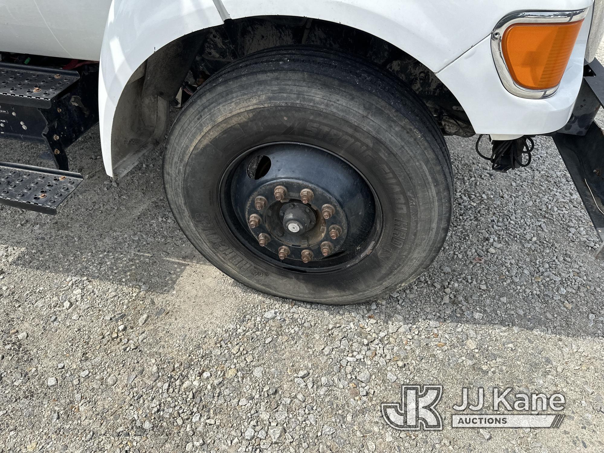 (Villa Rica, GA) Altec LR756, Over-Center Bucket Truck mounted behind cab on 2013 Ford F750 Chipper