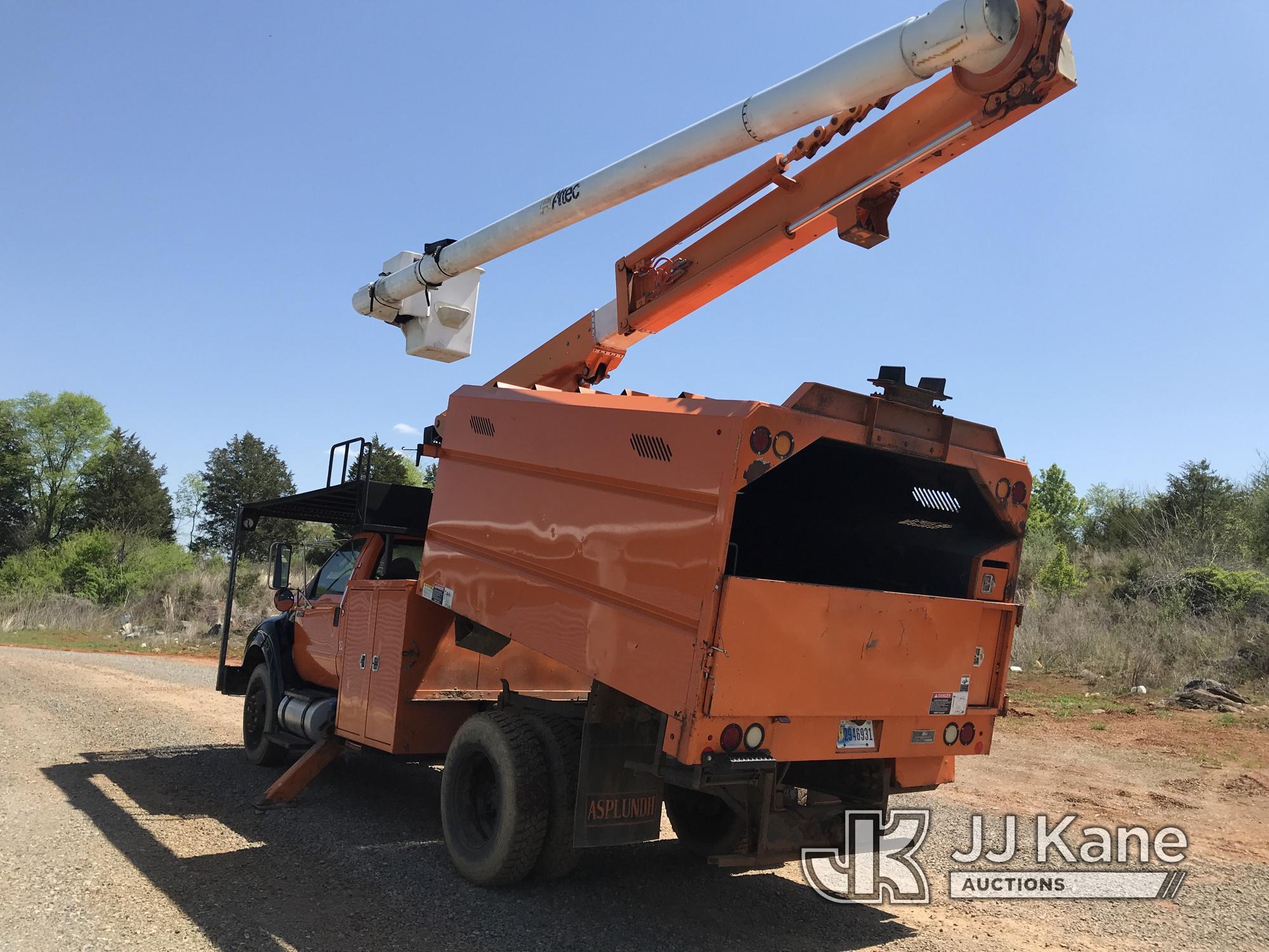 (Kodak, TN) Altec LR756, Over-Center Bucket Truck mounted behind cab on 2013 Ford F750 Chipper Dump