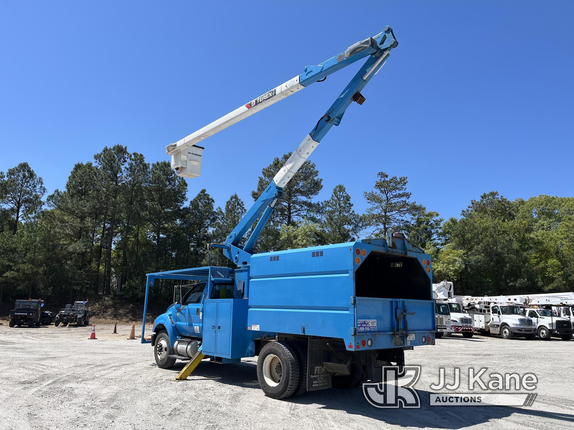 (Chester, VA) Terex XT55, Over-Center Bucket Truck mounted behind cab on 2012 Ford F750 Chipper Dump