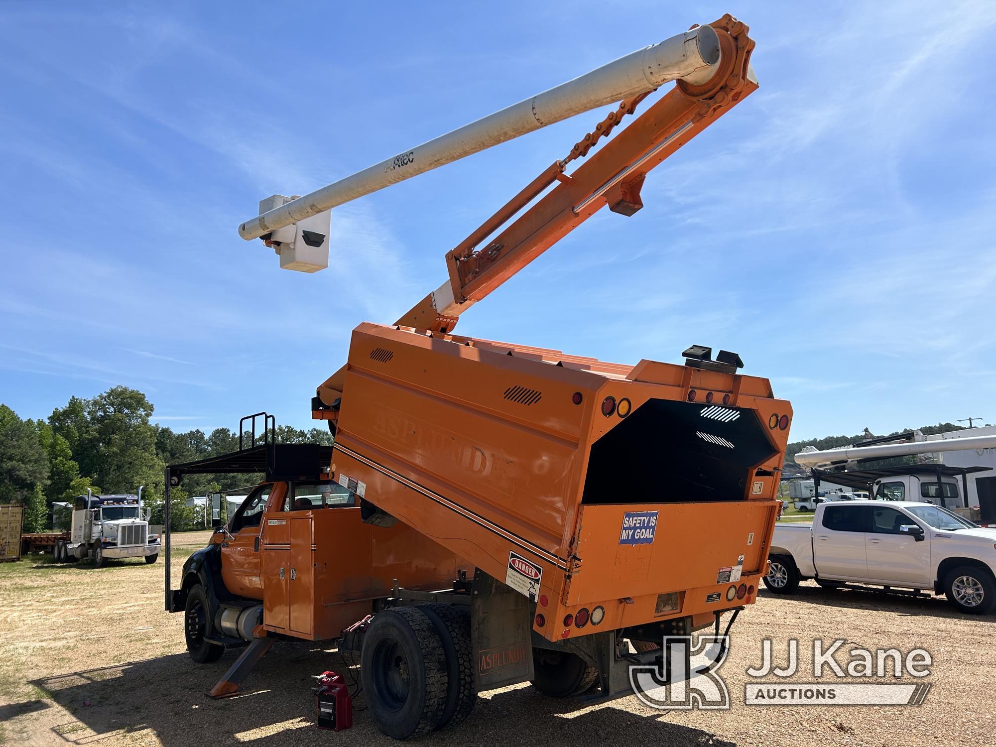 (Byram, MS) Altec LR756, Over-Center Bucket Truck mounted behind cab on 2013 Ford F750 Chipper Dump
