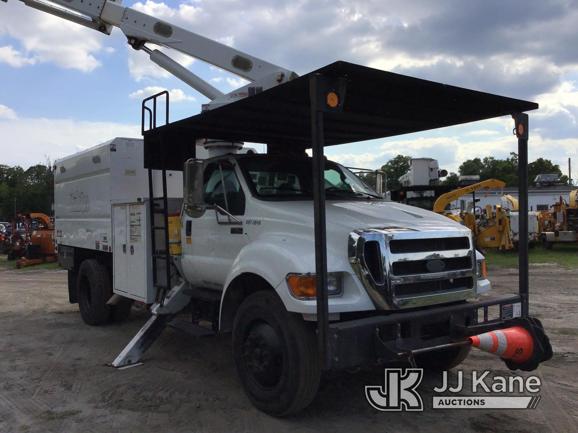 (Ocala, FL) Altec LR756, Over-Center Bucket Truck mounted behind cab on 2013 Ford F750 Chipper Dump