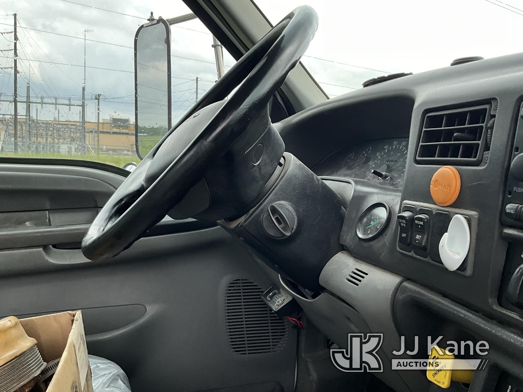 (Elizabethtown, KY) Peterson TL3, Grappleboom Crane mounted behind cab on 2009 Ford F750 Dump Debris