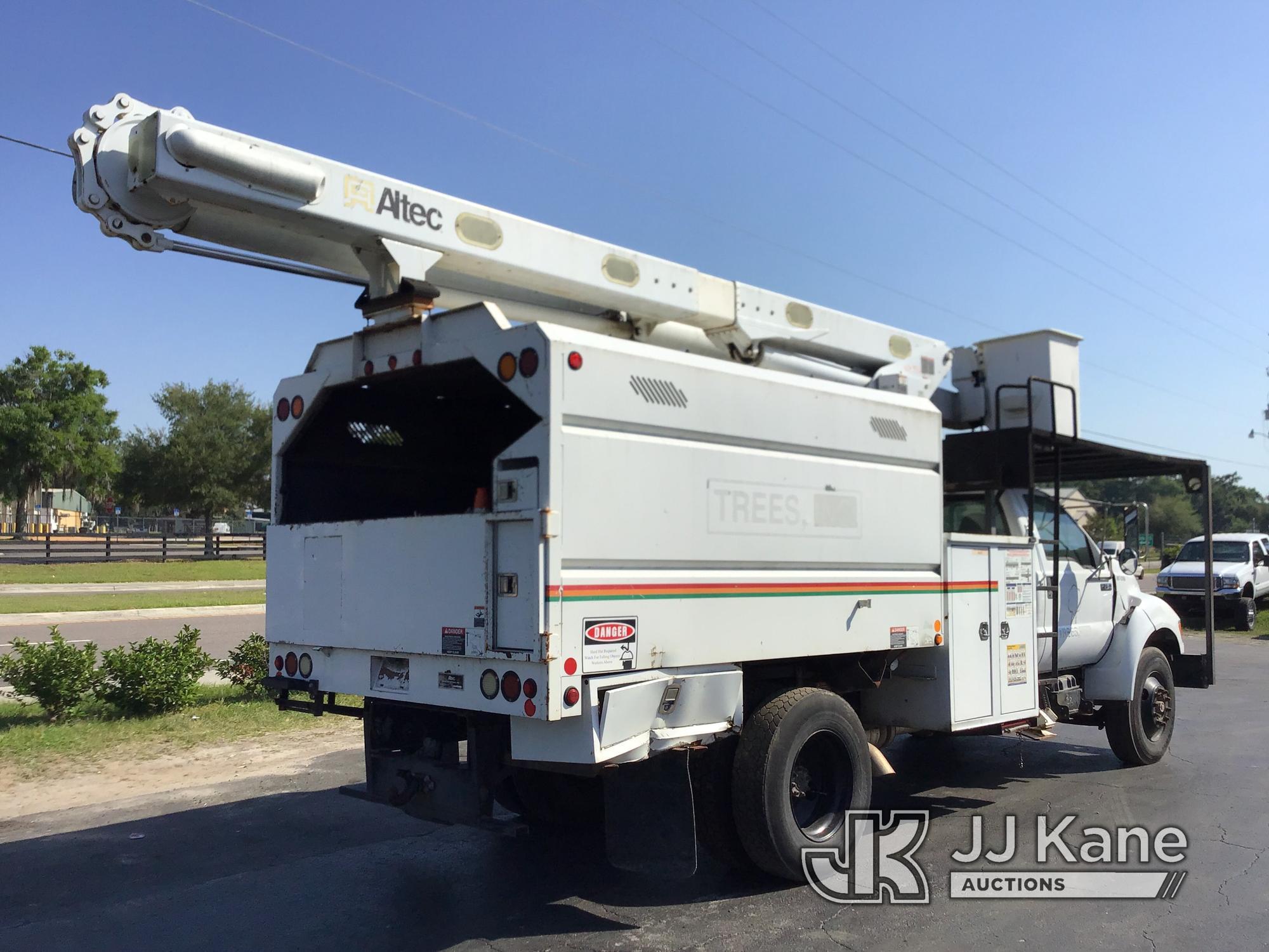 (Ocala, FL) Altec LR756, Over-Center Bucket Truck mounted behind cab on 2013 Ford F750 Chipper Dump