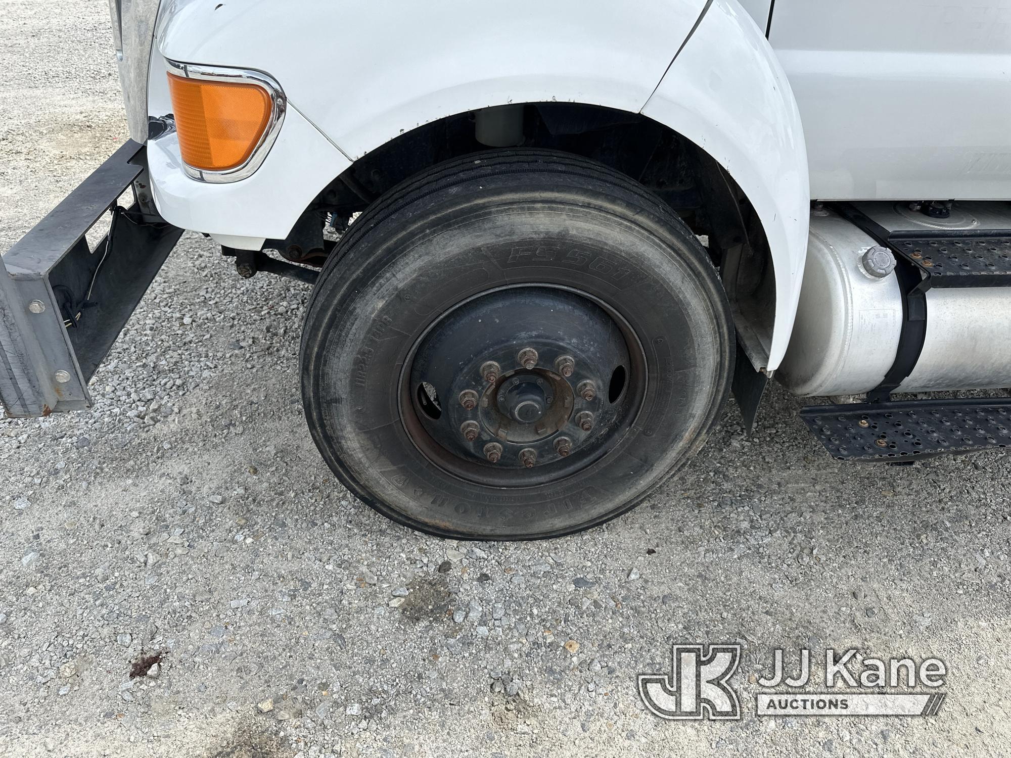 (Villa Rica, GA) Altec LR756, Over-Center Bucket Truck mounted behind cab on 2013 Ford F750 Chipper