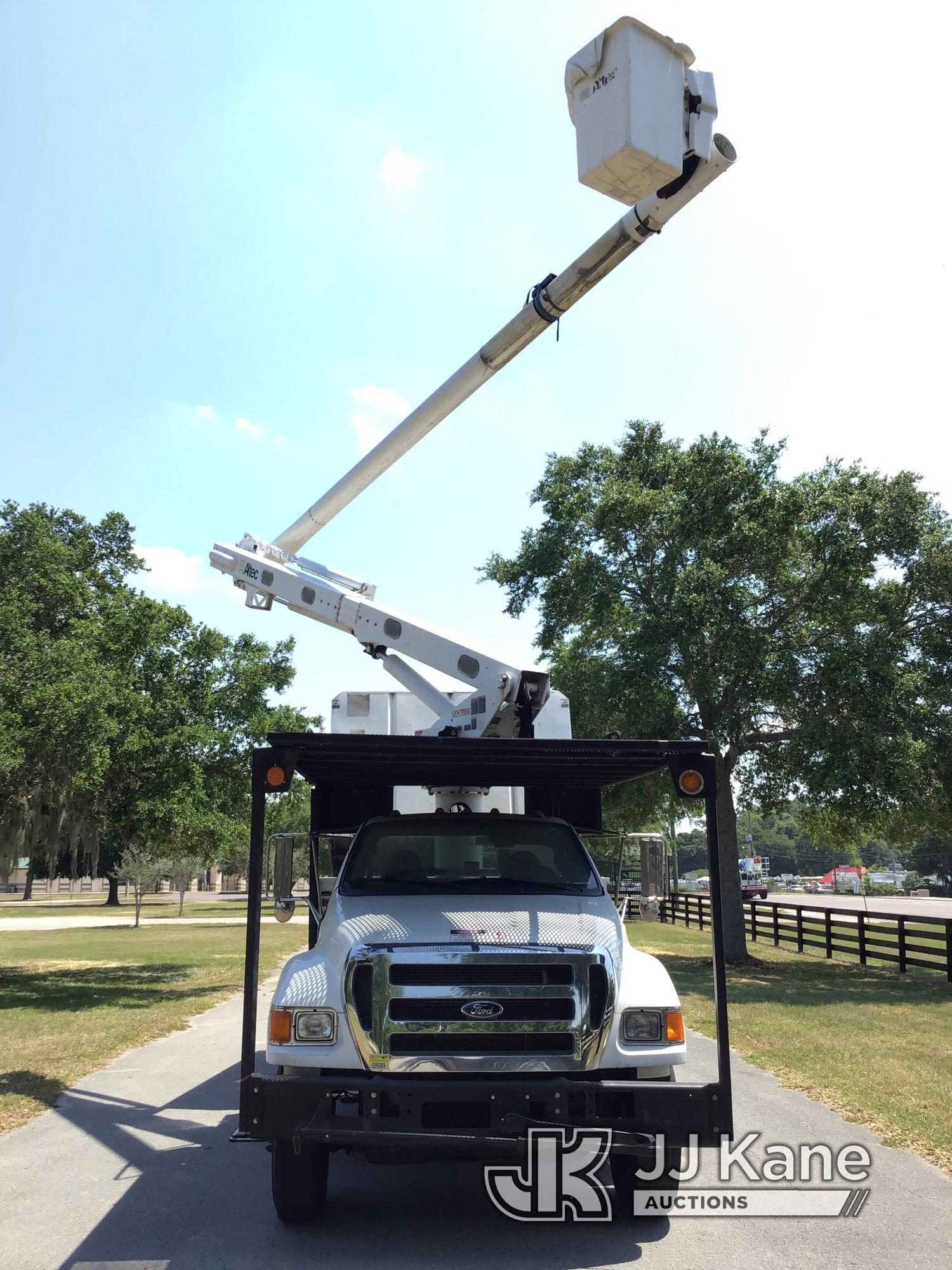 (Ocala, FL) Altec LR756, Over-Center Bucket Truck mounted behind cab on 2013 Ford F750 Chipper Dump