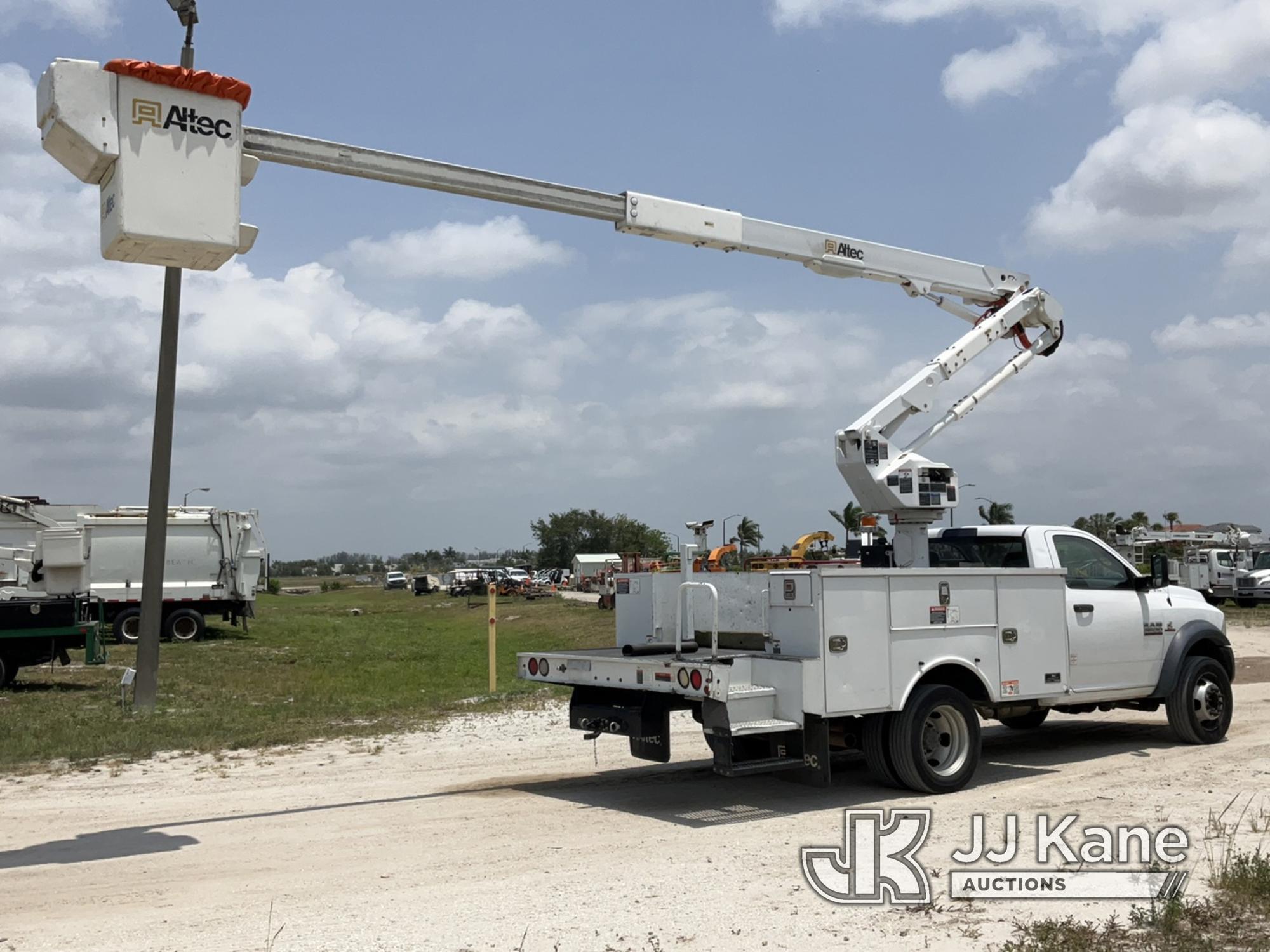 (Westlake, FL) Altec AT40G, Articulating & Telescopic Bucket Truck mounted behind cab on 2015 RAM 55