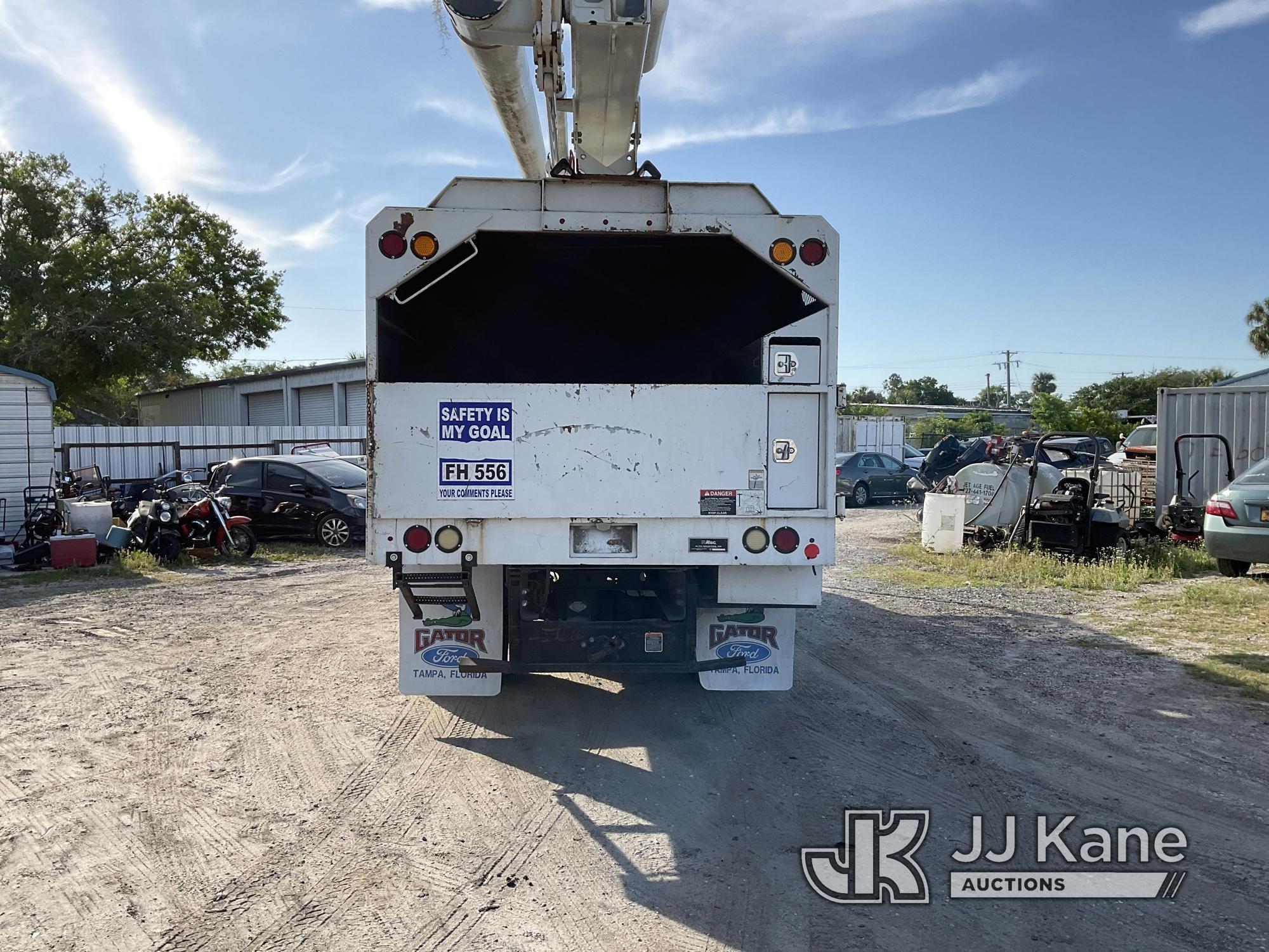 (Tampa, FL) Altec LRV-56, Over-Center Bucket Truck mounted behind cab on 2010 Ford F750 Chipper Dump