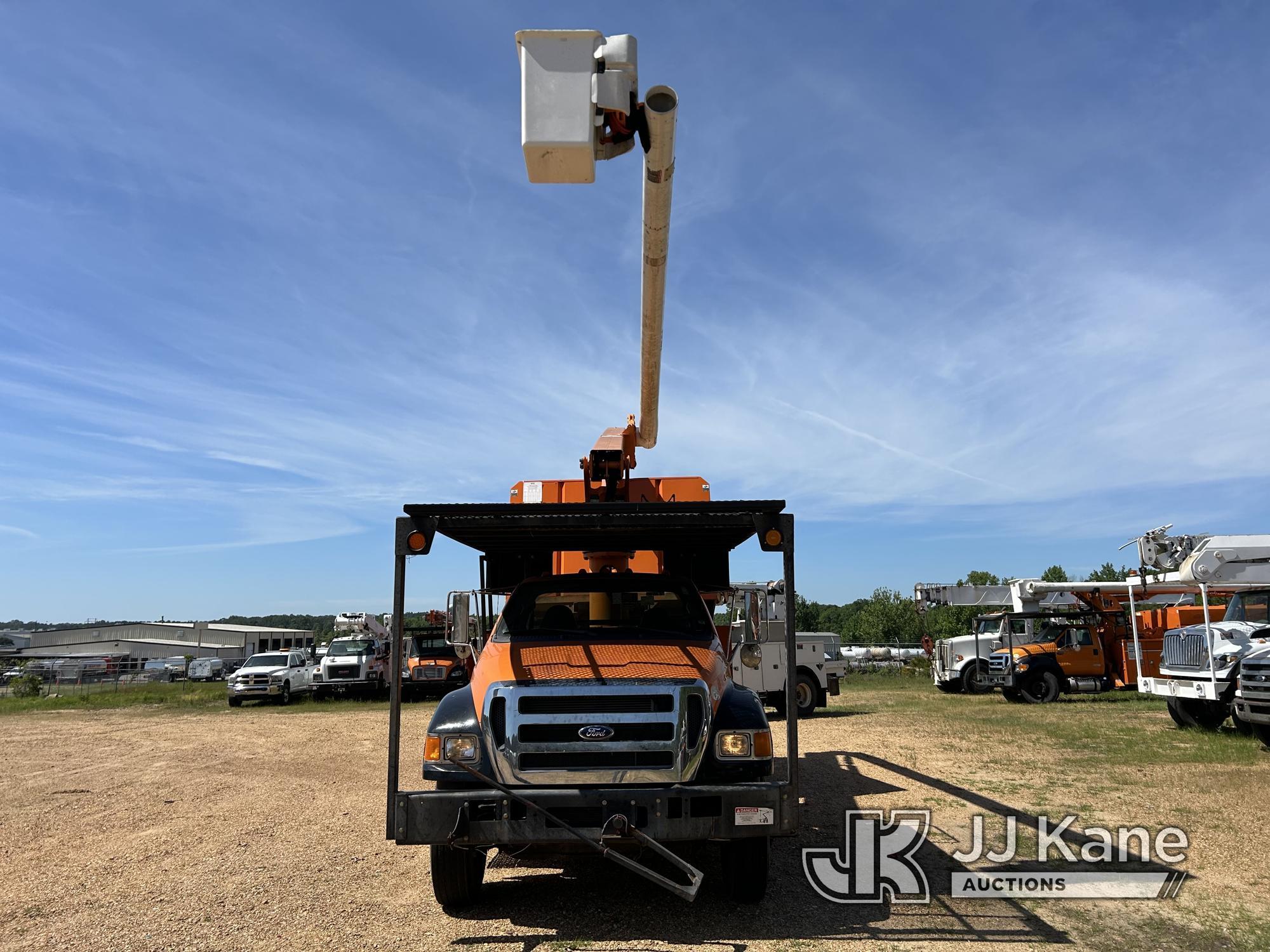 (Byram, MS) Altec LR756, Over-Center Bucket Truck mounted behind cab on 2013 Ford F750 Chipper Dump