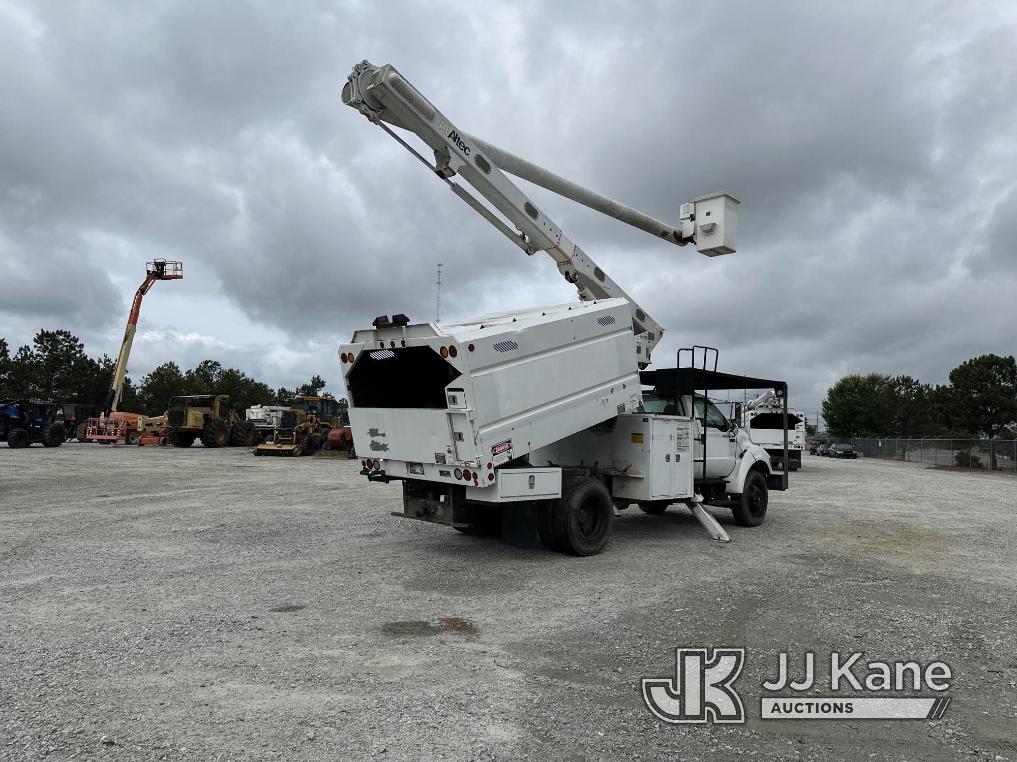 (Villa Rica, GA) Altec LR756, Over-Center Bucket Truck mounted behind cab on 2013 Ford F750 Chipper