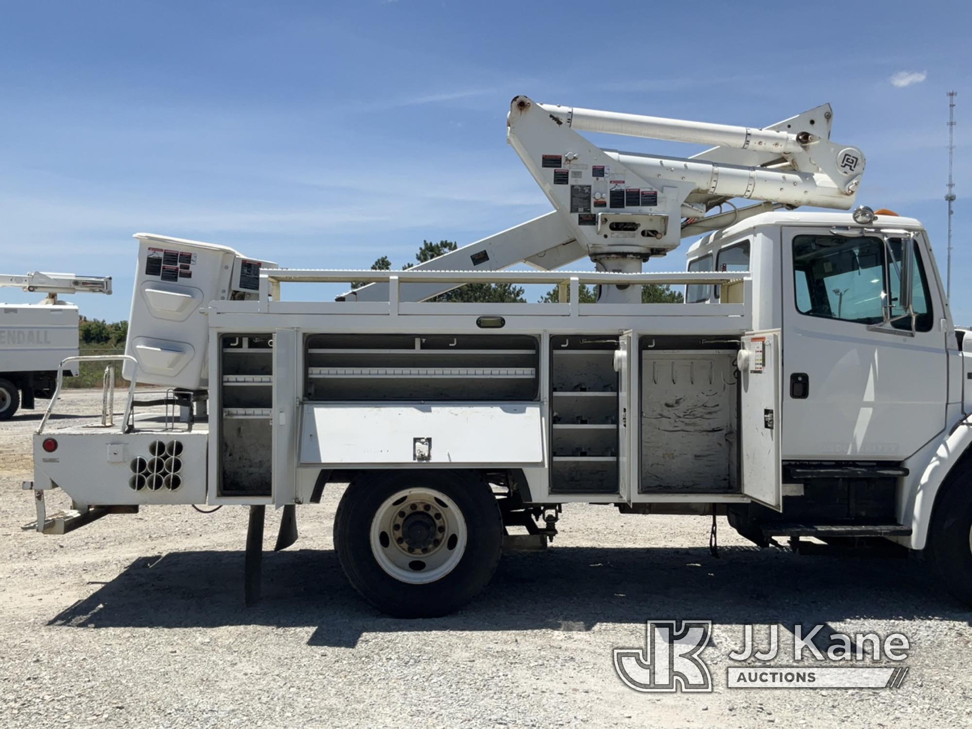 (Villa Rica, GA) Altec TA40, Articulating & Telescopic Bucket Truck mounted behind cab on 2002 Freig