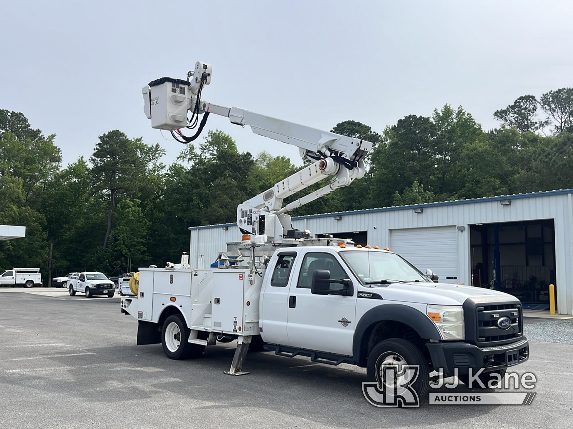 (Supply, NC) Altec AT40M, Articulating & Telescopic Material Handling Bucket Truck mounted behind ca